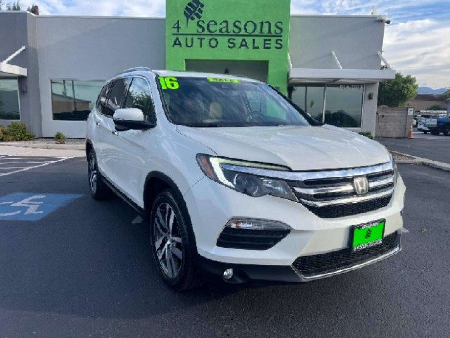 2016 White Diamond Pearl /Beige Honda Pilot Touring (5FNYF5H93GB) with an 3.5L V-6 gasoline direct injection engine, Automatic transmission, located at 1865 East Red Hills Pkwy, St. George, 84770, (435) 628-0023, 37.120850, -113.543640 - We specialize in helping ALL people get the best financing available. No matter your credit score, good, bad or none we can get you an amazing rate. Had a bankruptcy, divorce, or repossessions? We give you the green light to get your credit back on the road. Low down and affordable payments that fit- Photo#0