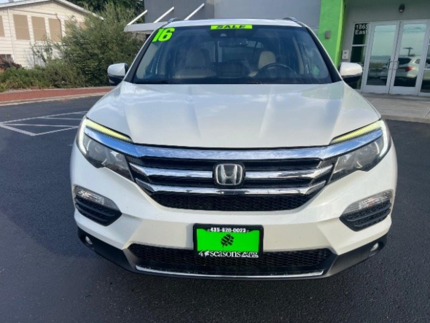 2016 White Diamond Pearl /Beige Honda Pilot Touring (5FNYF5H93GB) with an 3.5L V-6 gasoline direct injection engine, Automatic transmission, located at 1865 East Red Hills Pkwy, St. George, 84770, (435) 628-0023, 37.120850, -113.543640 - We specialize in helping ALL people get the best financing available. No matter your credit score, good, bad or none we can get you an amazing rate. Had a bankruptcy, divorce, or repossessions? We give you the green light to get your credit back on the road. Low down and affordable payments that fit- Photo#1