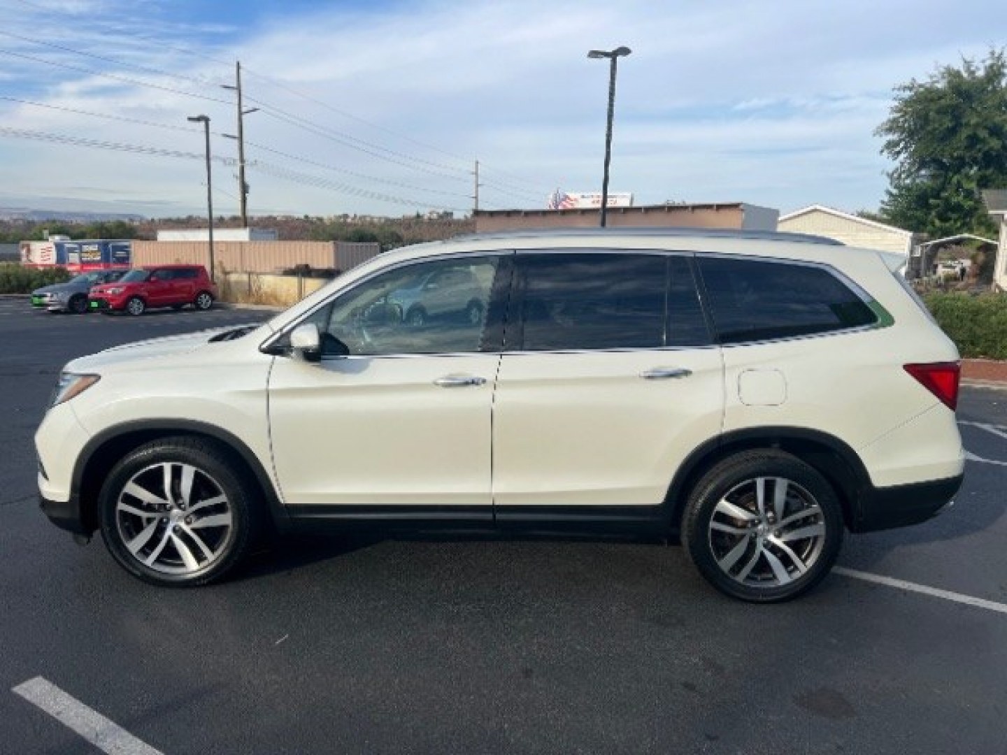2016 White Diamond Pearl /Beige Honda Pilot Touring (5FNYF5H93GB) with an 3.5L V-6 gasoline direct injection engine, Automatic transmission, located at 1865 East Red Hills Pkwy, St. George, 84770, (435) 628-0023, 37.120850, -113.543640 - We specialize in helping ALL people get the best financing available. No matter your credit score, good, bad or none we can get you an amazing rate. Had a bankruptcy, divorce, or repossessions? We give you the green light to get your credit back on the road. Low down and affordable payments that fit- Photo#3