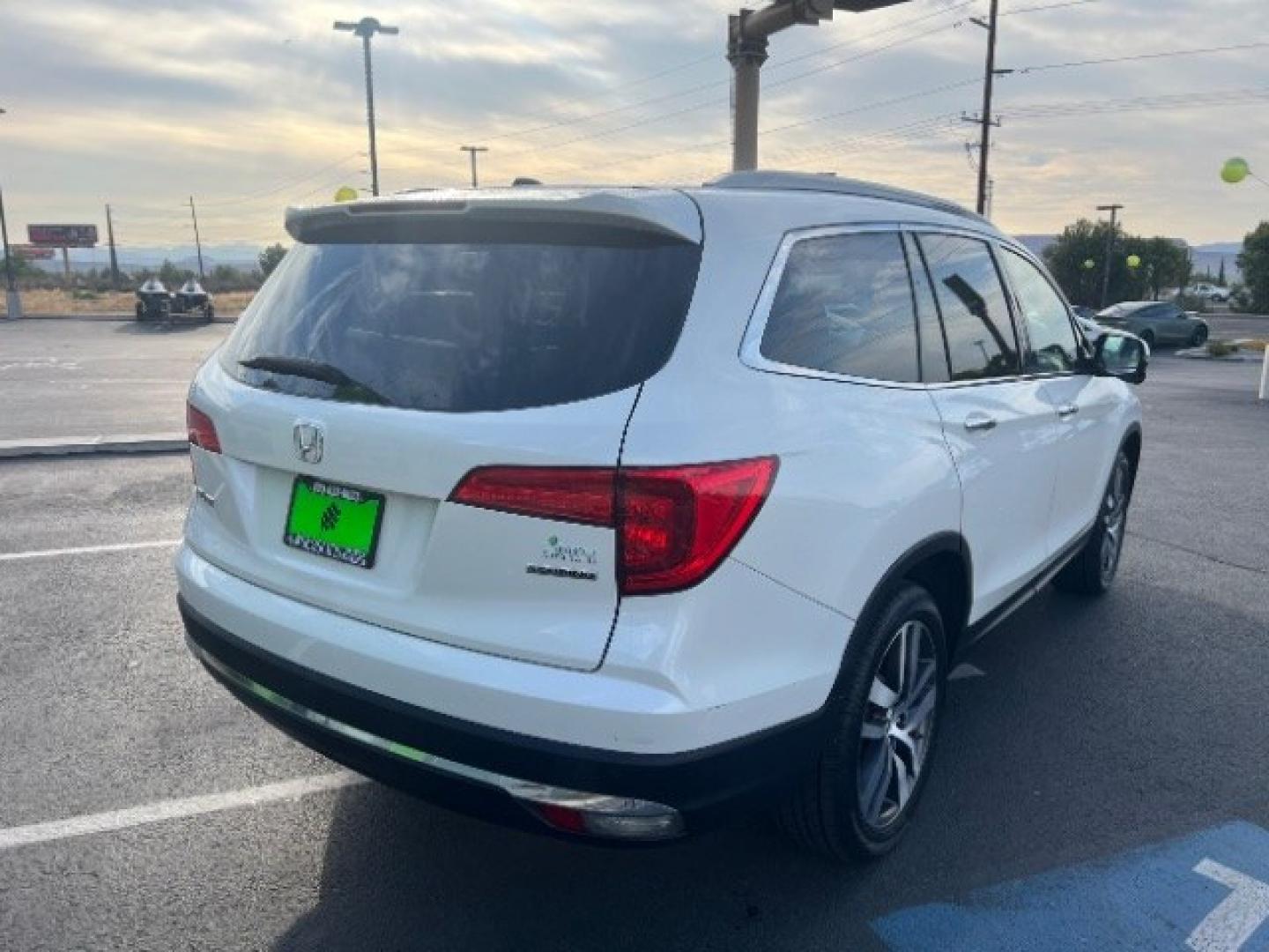 2016 White Diamond Pearl /Beige Honda Pilot Touring (5FNYF5H93GB) with an 3.5L V-6 gasoline direct injection engine, Automatic transmission, located at 1865 East Red Hills Pkwy, St. George, 84770, (435) 628-0023, 37.120850, -113.543640 - We specialize in helping ALL people get the best financing available. No matter your credit score, good, bad or none we can get you an amazing rate. Had a bankruptcy, divorce, or repossessions? We give you the green light to get your credit back on the road. Low down and affordable payments that fit- Photo#6