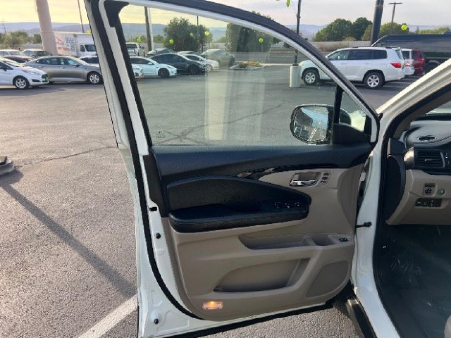 2016 White Diamond Pearl /Beige Honda Pilot Touring (5FNYF5H93GB) with an 3.5L V-6 gasoline direct injection engine, Automatic transmission, located at 1865 East Red Hills Pkwy, St. George, 84770, (435) 628-0023, 37.120850, -113.543640 - We specialize in helping ALL people get the best financing available. No matter your credit score, good, bad or none we can get you an amazing rate. Had a bankruptcy, divorce, or repossessions? We give you the green light to get your credit back on the road. Low down and affordable payments that fit- Photo#12
