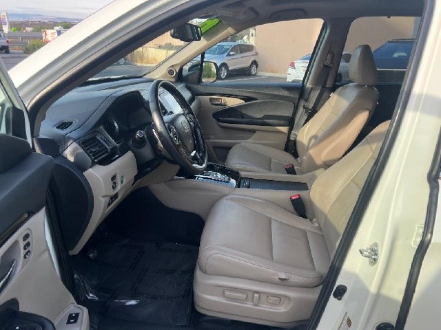 2016 White Diamond Pearl /Beige Honda Pilot Touring (5FNYF5H93GB) with an 3.5L V-6 gasoline direct injection engine, Automatic transmission, located at 1865 East Red Hills Pkwy, St. George, 84770, (435) 628-0023, 37.120850, -113.543640 - We specialize in helping ALL people get the best financing available. No matter your credit score, good, bad or none we can get you an amazing rate. Had a bankruptcy, divorce, or repossessions? We give you the green light to get your credit back on the road. Low down and affordable payments that fit- Photo#14