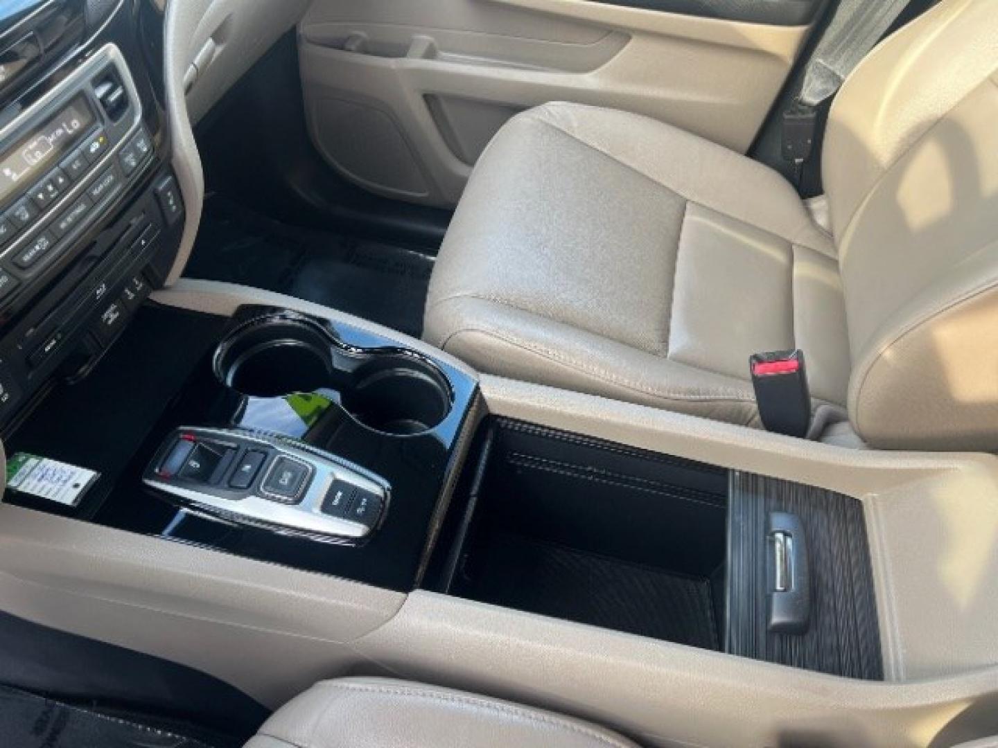 2016 White Diamond Pearl /Beige Honda Pilot Touring (5FNYF5H93GB) with an 3.5L V-6 gasoline direct injection engine, Automatic transmission, located at 1865 East Red Hills Pkwy, St. George, 84770, (435) 628-0023, 37.120850, -113.543640 - We specialize in helping ALL people get the best financing available. No matter your credit score, good, bad or none we can get you an amazing rate. Had a bankruptcy, divorce, or repossessions? We give you the green light to get your credit back on the road. Low down and affordable payments that fit- Photo#18