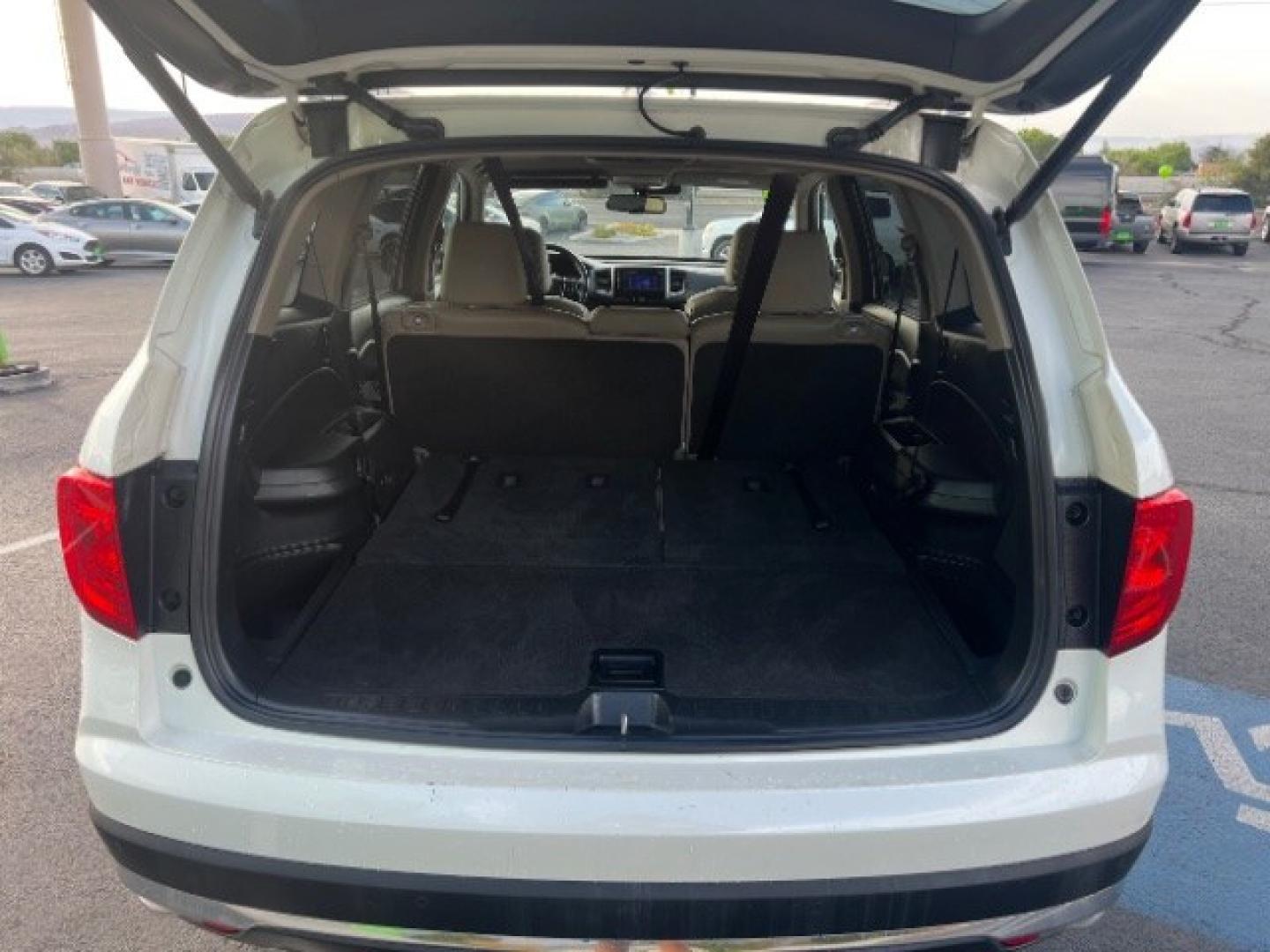2016 White Diamond Pearl /Beige Honda Pilot Touring (5FNYF5H93GB) with an 3.5L V-6 gasoline direct injection engine, Automatic transmission, located at 1865 East Red Hills Pkwy, St. George, 84770, (435) 628-0023, 37.120850, -113.543640 - We specialize in helping ALL people get the best financing available. No matter your credit score, good, bad or none we can get you an amazing rate. Had a bankruptcy, divorce, or repossessions? We give you the green light to get your credit back on the road. Low down and affordable payments that fit- Photo#24