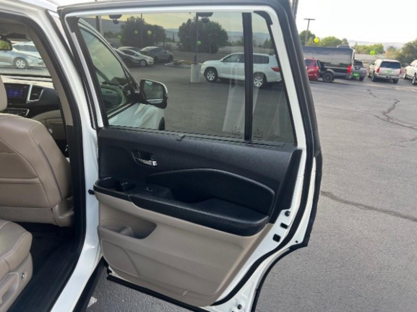 2016 White Diamond Pearl /Beige Honda Pilot Touring (5FNYF5H93GB) with an 3.5L V-6 gasoline direct injection engine, Automatic transmission, located at 1865 East Red Hills Pkwy, St. George, 84770, (435) 628-0023, 37.120850, -113.543640 - We specialize in helping ALL people get the best financing available. No matter your credit score, good, bad or none we can get you an amazing rate. Had a bankruptcy, divorce, or repossessions? We give you the green light to get your credit back on the road. Low down and affordable payments that fit- Photo#25