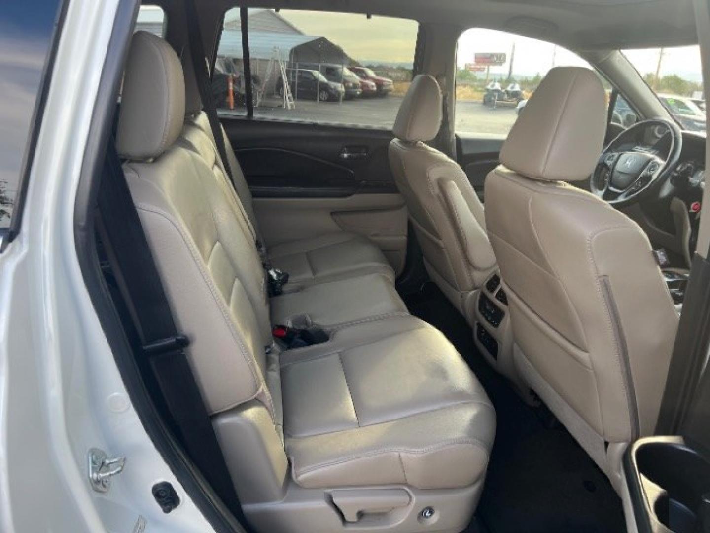2016 White Diamond Pearl /Beige Honda Pilot Touring (5FNYF5H93GB) with an 3.5L V-6 gasoline direct injection engine, Automatic transmission, located at 1865 East Red Hills Pkwy, St. George, 84770, (435) 628-0023, 37.120850, -113.543640 - We specialize in helping ALL people get the best financing available. No matter your credit score, good, bad or none we can get you an amazing rate. Had a bankruptcy, divorce, or repossessions? We give you the green light to get your credit back on the road. Low down and affordable payments that fit- Photo#26