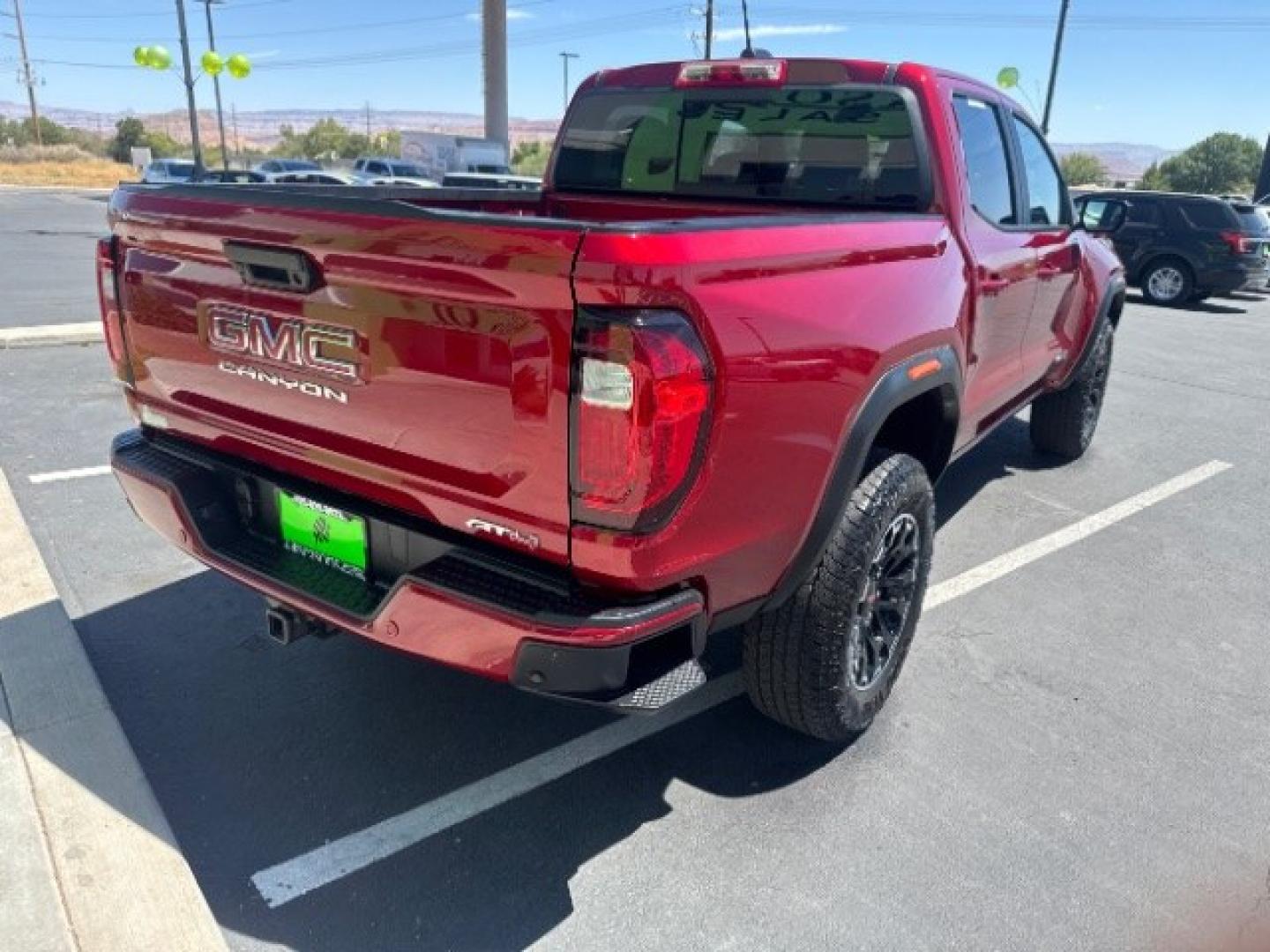 2026 Volcanic Red Tintcoat /Jet Black/Timber GMC Canyon AT4, 4WD (1GTP2DEK9T1) with an 2.7L I-4 direct injection engine, Automatic transmission, located at 1865 East Red Hills Pkwy, St. George, 84770, (435) 628-0023, 37.120850, -113.543640 - Practically new and ready for Southern Utah? This Volcanic Red Tintcoat 2026 GMC Canyon AT4 4WD brings a VIN-decoded 2.7L TurboMax 4-cylinder, 8-speed automatic, and confident 4x4 traction for daily driving, trailheads, and work. With only 13,031 miles, it has the look and capability of a fresh pick- Photo#6