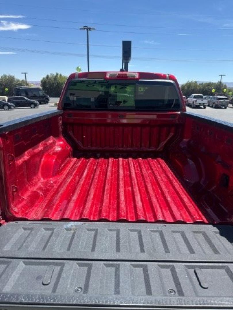 2026 Volcanic Red Tintcoat /Jet Black/Timber GMC Canyon AT4, 4WD (1GTP2DEK9T1) with an 2.7L I-4 direct injection engine, Automatic transmission, located at 1865 East Red Hills Pkwy, St. George, 84770, (435) 628-0023, 37.120850, -113.543640 - Practically new and ready for Southern Utah? This Volcanic Red Tintcoat 2026 GMC Canyon AT4 4WD brings a VIN-decoded 2.7L TurboMax 4-cylinder, 8-speed automatic, and confident 4x4 traction for daily driving, trailheads, and work. With only 13,031 miles, it has the look and capability of a fresh pick- Photo#18