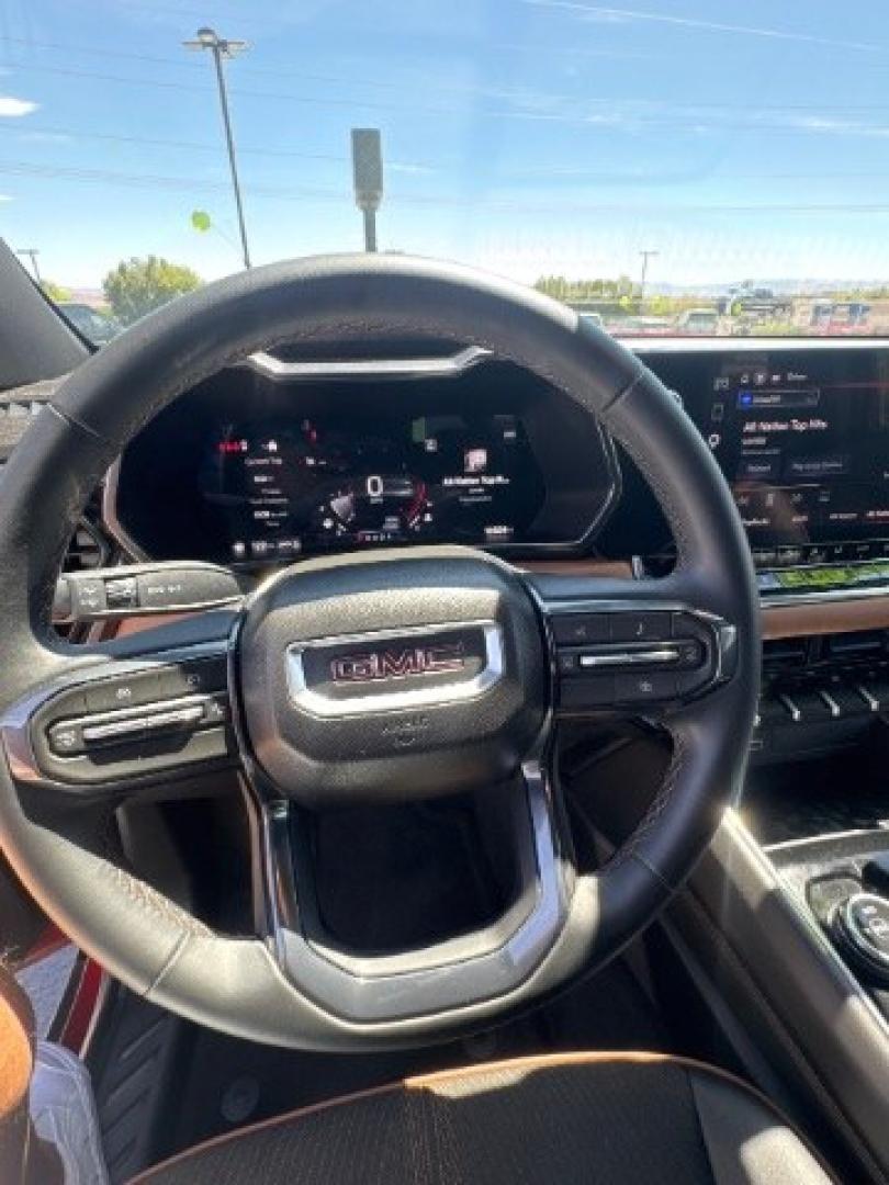 2026 Volcanic Red Tintcoat /Jet Black/Timber GMC Canyon AT4, 4WD (1GTP2DEK9T1) with an 2.7L I-4 direct injection engine, Automatic transmission, located at 1865 East Red Hills Pkwy, St. George, 84770, (435) 628-0023, 37.120850, -113.543640 - Practically new and ready for Southern Utah? This Volcanic Red Tintcoat 2026 GMC Canyon AT4 4WD brings a VIN-decoded 2.7L TurboMax 4-cylinder, 8-speed automatic, and confident 4x4 traction for daily driving, trailheads, and work. With only 13,031 miles, it has the look and capability of a fresh pick- Photo#31