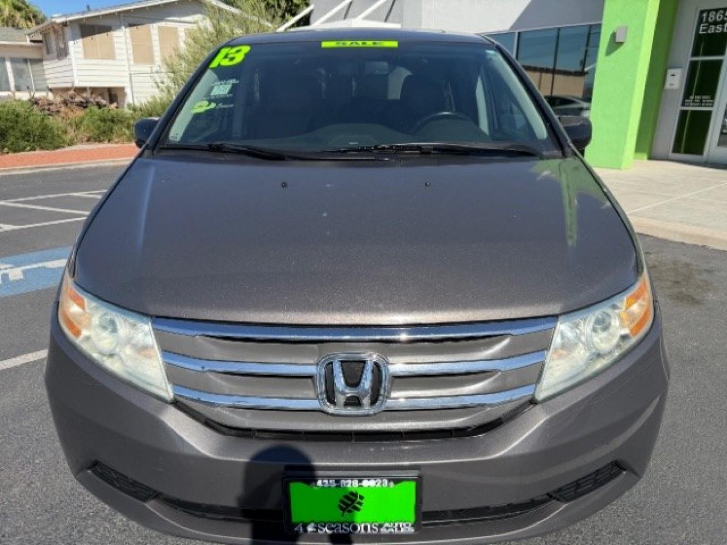 2013 Smoky Topaz Metallic /Truffle Honda Odyssey EX-L (5FNRL5H65DB) with an 3.5L V-6 i-VTEC variable valve control engine, Automatic transmission, located at 1865 East Red Hills Pkwy, St. George, 84770, (435) 628-0023, 37.120850, -113.543640 - Versatile Southern Utah travel starts with this 2013 Honda Odyssey EX-L. Its 3.5L V6 engine, automatic transmission, and front-wheel drive make it a smart fit for school runs, road trips, and family errands. With 152993 miles, this Odyssey is ready for its next adventure. The EX-L adds leather seat- Photo#1