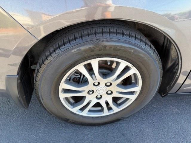 2013 Smoky Topaz Metallic /Truffle Honda Odyssey EX-L (5FNRL5H65DB) with an 3.5L V-6 i-VTEC variable valve control engine, Automatic transmission, located at 1865 East Red Hills Pkwy, St. George, 84770, (435) 628-0023, 37.120850, -113.543640 - This 2013 Honda Odyssey EX-L sits in St. George at $12,000. The odometer reads 152,993. Listed sales price includes $300 doc fee. 4 REASONS TO BUY FROM 4 SEASONS ~~CERTIFIED PREOWNED - This vehicle has gone through a 50 point inspection and road test. We fixed everything that was broken or worn o- Photo#7