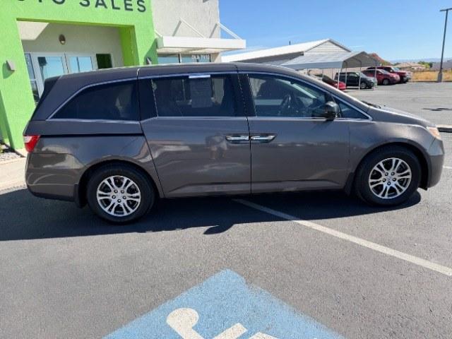 2013 Smoky Topaz Metallic /Truffle Honda Odyssey EX-L (5FNRL5H65DB) with an 3.5L V-6 i-VTEC variable valve control engine, Automatic transmission, located at 1865 East Red Hills Pkwy, St. George, 84770, (435) 628-0023, 37.120850, -113.543640 - This 2013 Honda Odyssey EX-L sits in St. George at $12,000. The odometer reads 152,993. Listed sales price includes $300 doc fee. 4 REASONS TO BUY FROM 4 SEASONS ~~CERTIFIED PREOWNED - This vehicle has gone through a 50 point inspection and road test. We fixed everything that was broken or worn o- Photo#9