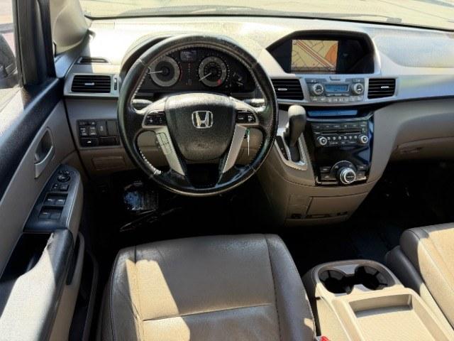 2013 Smoky Topaz Metallic /Truffle Honda Odyssey EX-L (5FNRL5H65DB) with an 3.5L V-6 i-VTEC variable valve control engine, Automatic transmission, located at 1865 East Red Hills Pkwy, St. George, 84770, (435) 628-0023, 37.120850, -113.543640 - This 2013 Honda Odyssey EX-L sits in St. George at $12,000. The odometer reads 152,993. Listed sales price includes $300 doc fee. 4 REASONS TO BUY FROM 4 SEASONS ~~CERTIFIED PREOWNED - This vehicle has gone through a 50 point inspection and road test. We fixed everything that was broken or worn o- Photo#10