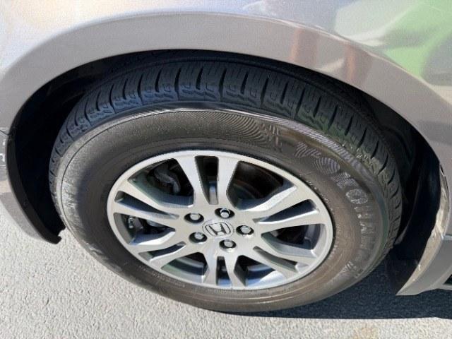 2013 Smoky Topaz Metallic /Truffle Honda Odyssey EX-L (5FNRL5H65DB) with an 3.5L V-6 i-VTEC variable valve control engine, Automatic transmission, located at 1865 East Red Hills Pkwy, St. George, 84770, (435) 628-0023, 37.120850, -113.543640 - This 2013 Honda Odyssey EX-L sits in St. George at $12,000. The odometer reads 152,993. Listed sales price includes $300 doc fee. 4 REASONS TO BUY FROM 4 SEASONS ~~CERTIFIED PREOWNED - This vehicle has gone through a 50 point inspection and road test. We fixed everything that was broken or worn o- Photo#11