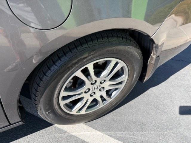 2013 Smoky Topaz Metallic /Truffle Honda Odyssey EX-L (5FNRL5H65DB) with an 3.5L V-6 i-VTEC variable valve control engine, Automatic transmission, located at 1865 East Red Hills Pkwy, St. George, 84770, (435) 628-0023, 37.120850, -113.543640 - This 2013 Honda Odyssey EX-L sits in St. George at $12,000. The odometer reads 152,993. Listed sales price includes $300 doc fee. 4 REASONS TO BUY FROM 4 SEASONS ~~CERTIFIED PREOWNED - This vehicle has gone through a 50 point inspection and road test. We fixed everything that was broken or worn o- Photo#12