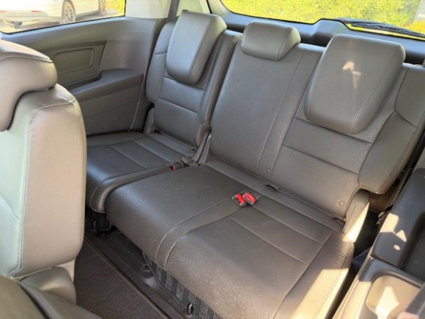 2013 Smoky Topaz Metallic /Truffle Honda Odyssey EX-L (5FNRL5H65DB) with an 3.5L V-6 i-VTEC variable valve control engine, Automatic transmission, located at 1865 East Red Hills Pkwy, St. George, 84770, (435) 628-0023, 37.120850, -113.543640 - Versatile Southern Utah travel starts with this 2013 Honda Odyssey EX-L. Its 3.5L V6 engine, automatic transmission, and front-wheel drive make it a smart fit for school runs, road trips, and family errands. With 152993 miles, this Odyssey is ready for its next adventure. The EX-L adds leather seat- Photo#22