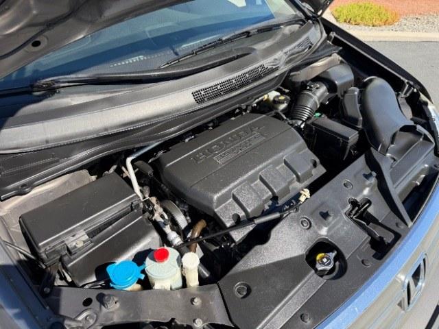 2013 Smoky Topaz Metallic /Truffle Honda Odyssey EX-L (5FNRL5H65DB) with an 3.5L V-6 i-VTEC variable valve control engine, Automatic transmission, located at 1865 East Red Hills Pkwy, St. George, 84770, (435) 628-0023, 37.120850, -113.543640 - This 2013 Honda Odyssey EX-L sits in St. George at $12,000. The odometer reads 152,993. Listed sales price includes $300 doc fee. 4 REASONS TO BUY FROM 4 SEASONS ~~CERTIFIED PREOWNED - This vehicle has gone through a 50 point inspection and road test. We fixed everything that was broken or worn o- Photo#25