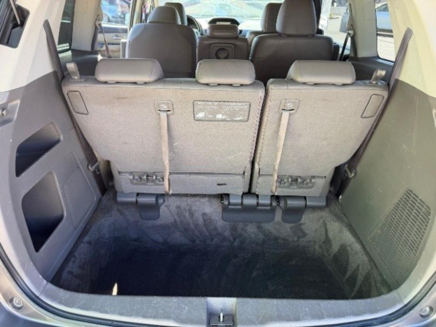 2013 Smoky Topaz Metallic /Truffle Honda Odyssey EX-L (5FNRL5H65DB) with an 3.5L V-6 i-VTEC variable valve control engine, Automatic transmission, located at 1865 East Red Hills Pkwy, St. George, 84770, (435) 628-0023, 37.120850, -113.543640 - Versatile Southern Utah travel starts with this 2013 Honda Odyssey EX-L. Its 3.5L V6 engine, automatic transmission, and front-wheel drive make it a smart fit for school runs, road trips, and family errands. With 152993 miles, this Odyssey is ready for its next adventure. The EX-L adds leather seat- Photo#27