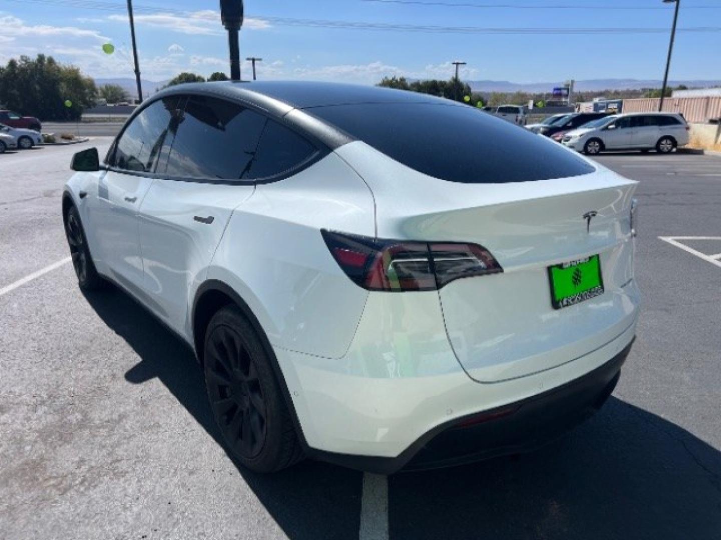 2021 Pearl White Multi-Coat /Black Tesla Model Y Long Range Dual Motor All-Wheel Drive (5YJYGDEE6MF) with an ELECTRIC engine, Electric transmission, located at 1865 East Red Hills Pkwy, St. George, 84770, (435) 628-0023, 37.120850, -113.543640 - Full Self Driving paid for! ($10k add on) Tesla Model Y All Wheel Drive HW3 and 5 Seats, Great tires, Power frunk, small scratch on rear bumper Interior is in great condition. Dont let the miles scare you this Tesla has been thoroughly inspected and has plenty of life. Every Tesla we sell has had- Photo#6