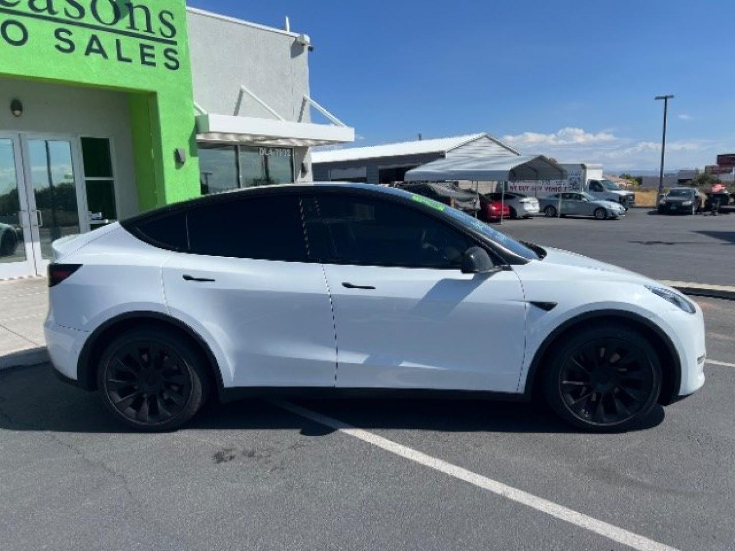 2021 Pearl White Multi-Coat /Black Tesla Model Y Long Range Dual Motor All-Wheel Drive (5YJYGDEE6MF) with an ELECTRIC engine, Electric transmission, located at 1865 East Red Hills Pkwy, St. George, 84770, (435) 628-0023, 37.120850, -113.543640 - Full Self Driving paid for! ($10k add on) Tesla Model Y All Wheel Drive HW3 and 5 Seats, Great tires, Power frunk, small scratch on rear bumper Interior is in great condition. Dont let the miles scare you this Tesla has been thoroughly inspected and has plenty of life. Every Tesla we sell has had- Photo#9