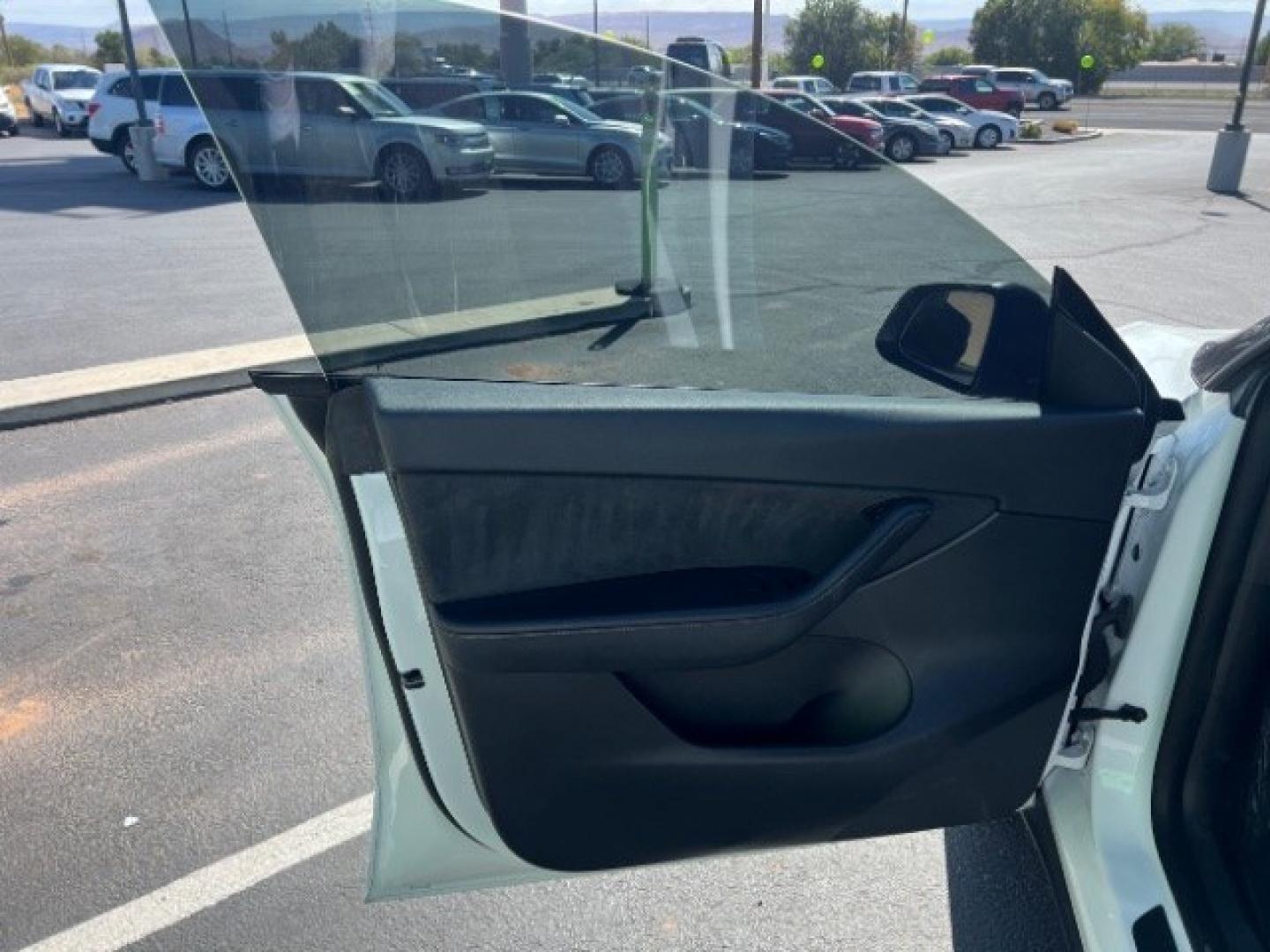 2021 Pearl White Multi-Coat /Black Tesla Model Y Long Range Dual Motor All-Wheel Drive (5YJYGDEE6MF) with an ELECTRIC engine, Electric transmission, located at 1865 East Red Hills Pkwy, St. George, 84770, (435) 628-0023, 37.120850, -113.543640 - Full Self Driving paid for! ($10k add on) Tesla Model Y All Wheel Drive HW3 and 5 Seats, Great tires, Power frunk, small scratch on rear bumper Interior is in great condition. Dont let the miles scare you this Tesla has been thoroughly inspected and has plenty of life. Every Tesla we sell has had- Photo#14