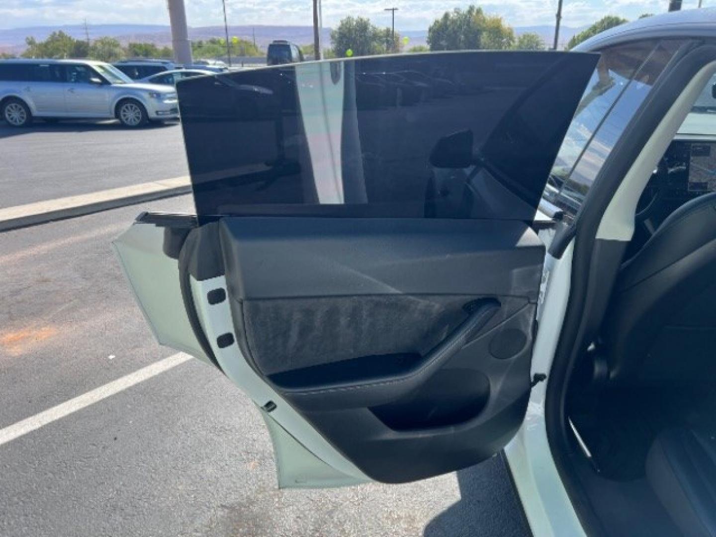 2021 Pearl White Multi-Coat /Black Tesla Model Y Long Range Dual Motor All-Wheel Drive (5YJYGDEE6MF) with an ELECTRIC engine, Electric transmission, located at 1865 East Red Hills Pkwy, St. George, 84770, (435) 628-0023, 37.120850, -113.543640 - Full Self Driving paid for! ($10k add on) Tesla Model Y All Wheel Drive HW3 and 5 Seats, Great tires, Power frunk, small scratch on rear bumper Interior is in great condition. Dont let the miles scare you this Tesla has been thoroughly inspected and has plenty of life. Every Tesla we sell has had- Photo#20