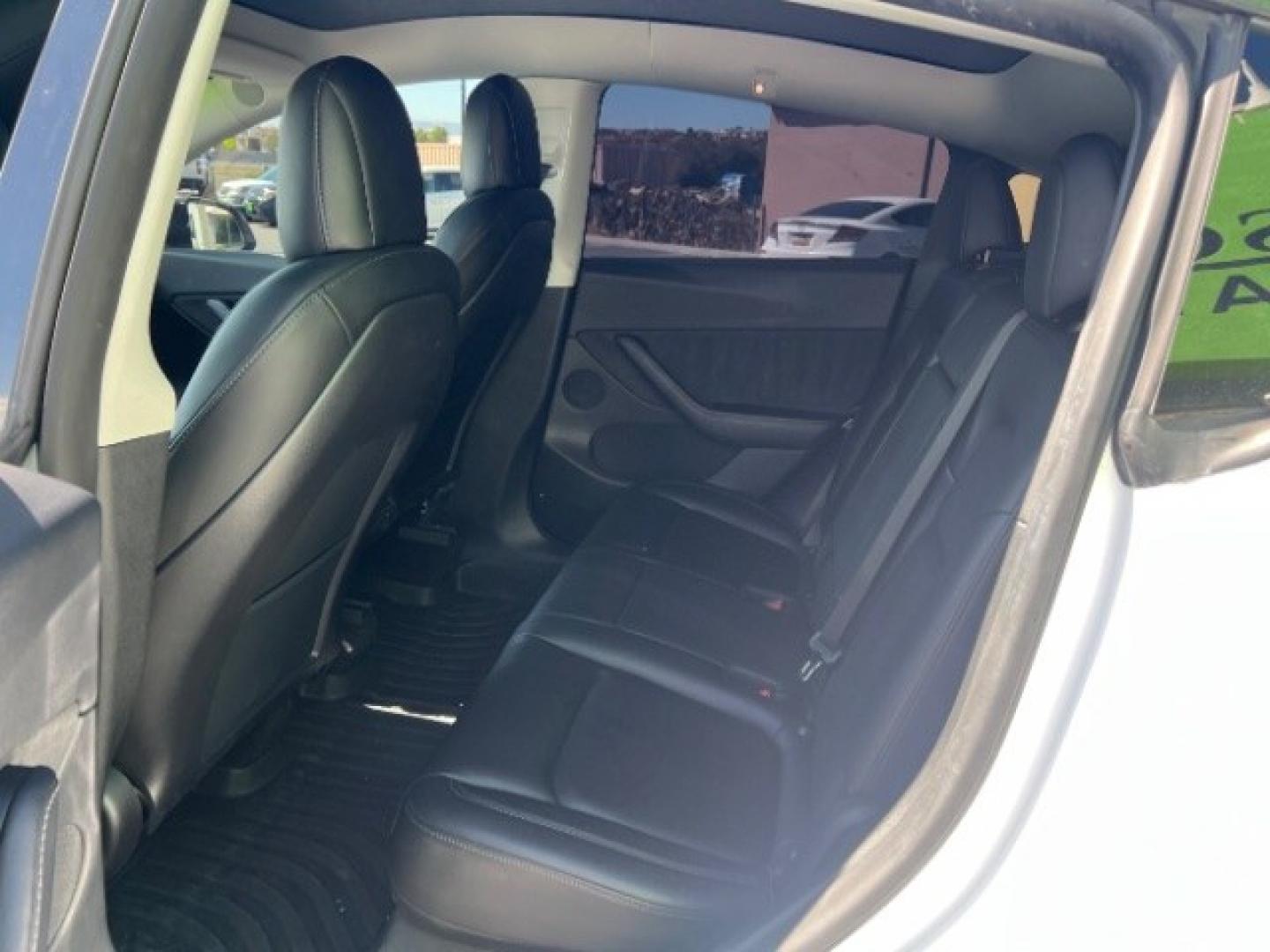2021 Pearl White Multi-Coat /Black Tesla Model Y Long Range Dual Motor All-Wheel Drive (5YJYGDEE6MF) with an ELECTRIC engine, Electric transmission, located at 1865 East Red Hills Pkwy, St. George, 84770, (435) 628-0023, 37.120850, -113.543640 - Full Self Driving paid for! ($10k add on) Tesla Model Y All Wheel Drive HW3 and 5 Seats, Great tires, Power frunk, small scratch on rear bumper Interior is in great condition. Dont let the miles scare you this Tesla has been thoroughly inspected and has plenty of life. Every Tesla we sell has had- Photo#21