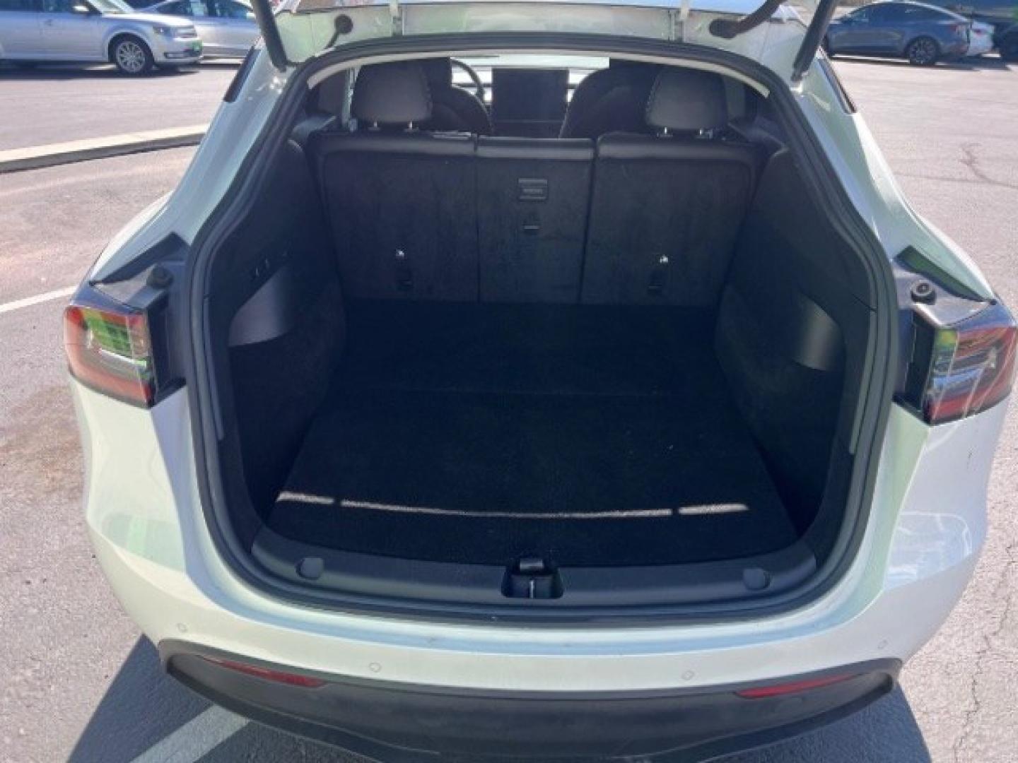 2021 Pearl White Multi-Coat /Black Tesla Model Y Long Range Dual Motor All-Wheel Drive (5YJYGDEE6MF) with an ELECTRIC engine, Electric transmission, located at 1865 East Red Hills Pkwy, St. George, 84770, (435) 628-0023, 37.120850, -113.543640 - Full Self Driving paid for! ($10k add on) Tesla Model Y All Wheel Drive HW3 and 5 Seats, Great tires, Power frunk, small scratch on rear bumper Interior is in great condition. Dont let the miles scare you this Tesla has been thoroughly inspected and has plenty of life. Every Tesla we sell has had- Photo#24