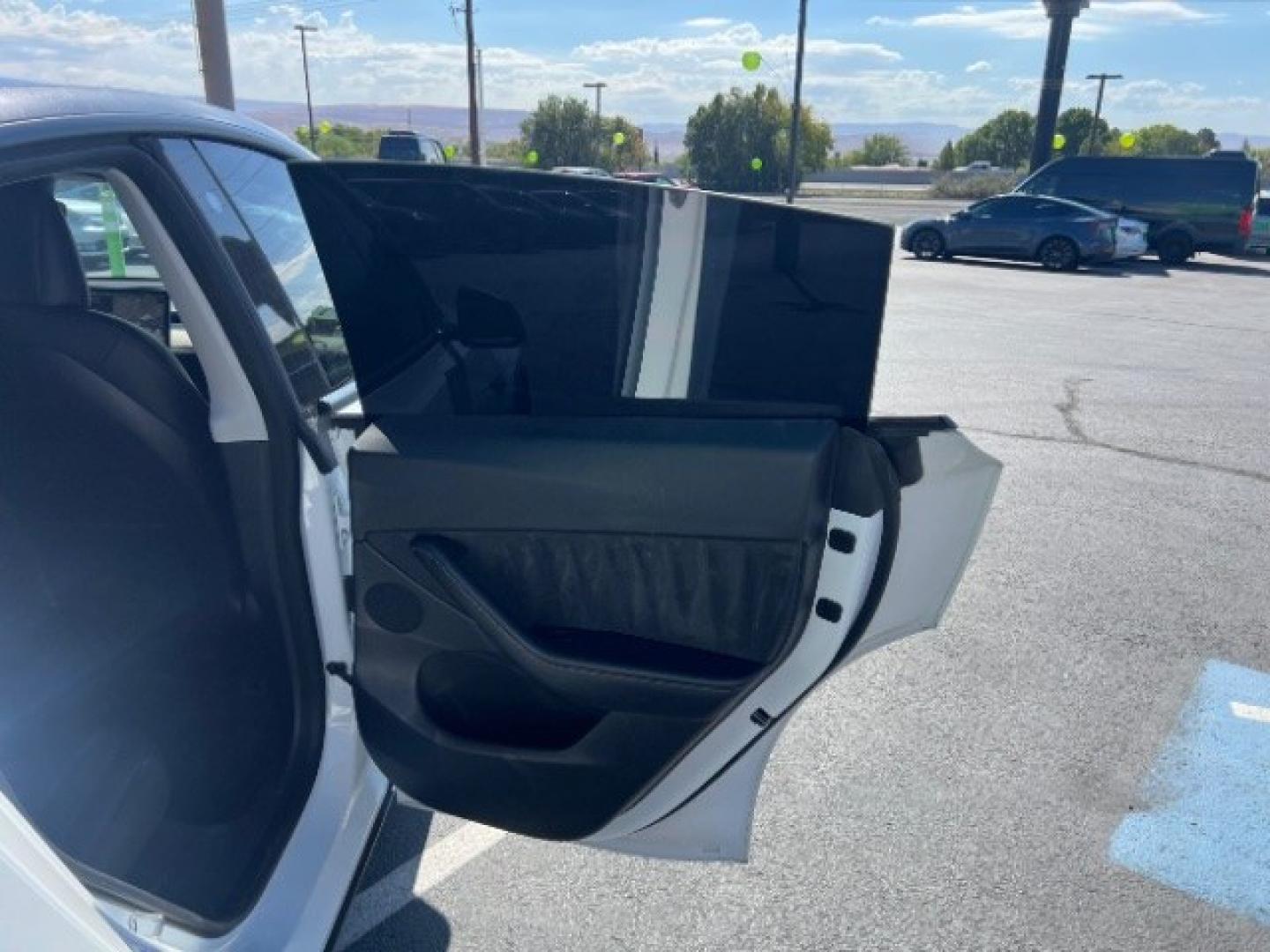 2021 Pearl White Multi-Coat /Black Tesla Model Y Long Range Dual Motor All-Wheel Drive (5YJYGDEE6MF) with an ELECTRIC engine, Electric transmission, located at 1865 East Red Hills Pkwy, St. George, 84770, (435) 628-0023, 37.120850, -113.543640 - Full Self Driving paid for! ($10k add on) Tesla Model Y All Wheel Drive HW3 and 5 Seats, Great tires, Power frunk, small scratch on rear bumper Interior is in great condition. Dont let the miles scare you this Tesla has been thoroughly inspected and has plenty of life. Every Tesla we sell has had- Photo#25