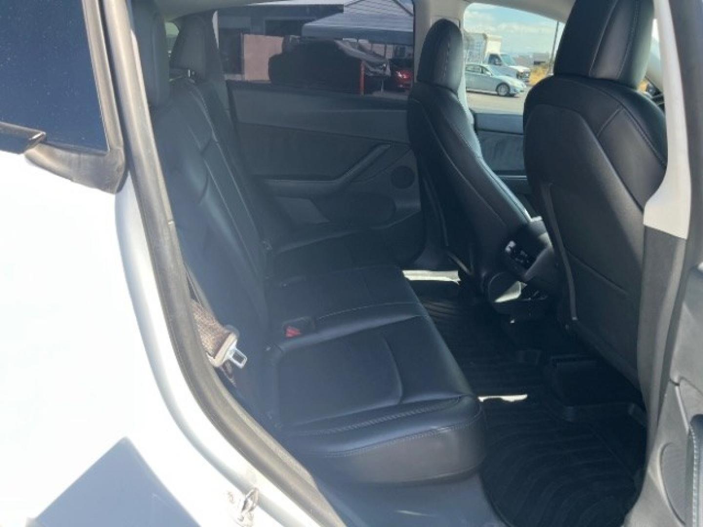 2021 Pearl White Multi-Coat /Black Tesla Model Y Long Range Dual Motor All-Wheel Drive (5YJYGDEE6MF) with an ELECTRIC engine, Electric transmission, located at 1865 East Red Hills Pkwy, St. George, 84770, (435) 628-0023, 37.120850, -113.543640 - Full Self Driving paid for! ($10k add on) Tesla Model Y All Wheel Drive HW3 and 5 Seats, Great tires, Power frunk, small scratch on rear bumper Interior is in great condition. Dont let the miles scare you this Tesla has been thoroughly inspected and has plenty of life. Every Tesla we sell has had- Photo#26