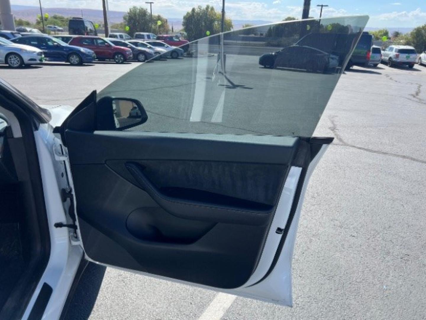 2021 Pearl White Multi-Coat /Black Tesla Model Y Long Range Dual Motor All-Wheel Drive (5YJYGDEE6MF) with an ELECTRIC engine, Electric transmission, located at 1865 East Red Hills Pkwy, St. George, 84770, (435) 628-0023, 37.120850, -113.543640 - Full Self Driving paid for! ($10k add on) Tesla Model Y All Wheel Drive HW3 and 5 Seats, Great tires, Power frunk, small scratch on rear bumper Interior is in great condition. Dont let the miles scare you this Tesla has been thoroughly inspected and has plenty of life. Every Tesla we sell has had- Photo#27