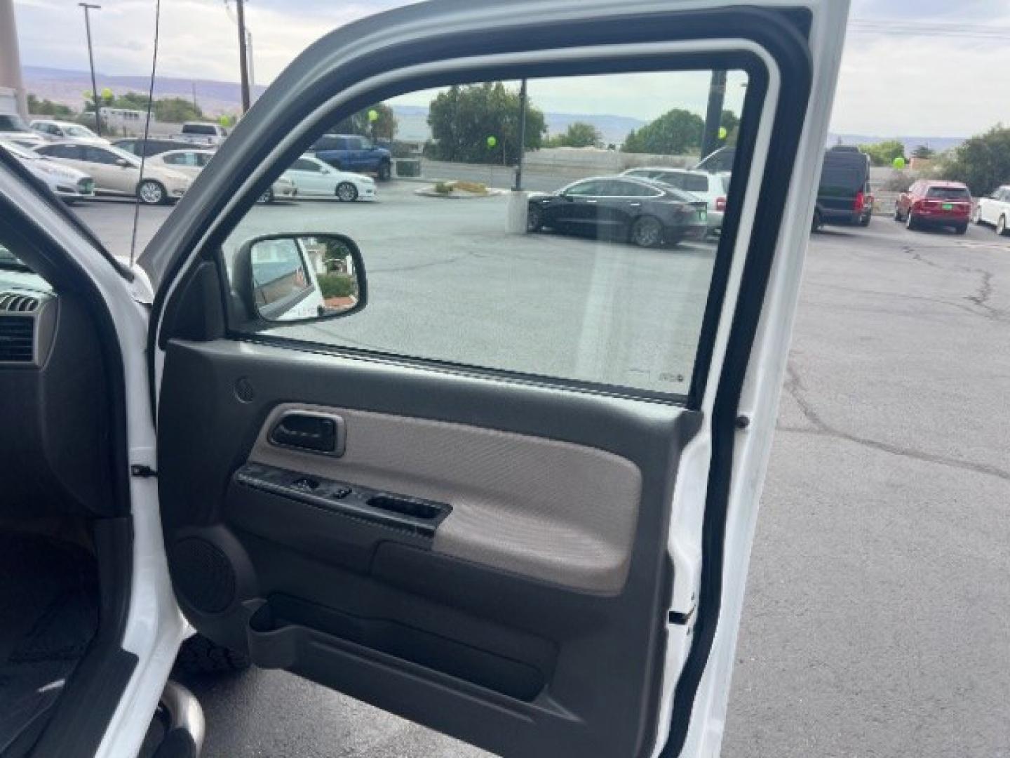 2005 Summit White /Pewter GMC Canyon SLE (1GTDS136258) with an Vortec 3.5L I-5 DOHC engine, Automatic transmission, located at 940 North Main Street, Cedar City, UT, 84720, (435) 628-0023, 37.692936, -113.061897 - Versatile Southern Utah travel starts with this 2005 GMC Canyon SLE Crew Cab. Its 3.5L five-cylinder, automatic transmission, and rear-wheel drive make it a smart fit for commuting, light hauling, and weekend projects. With 159,085 miles, this Canyon is ready for its next adventure. The SLE adds cr- Photo#24