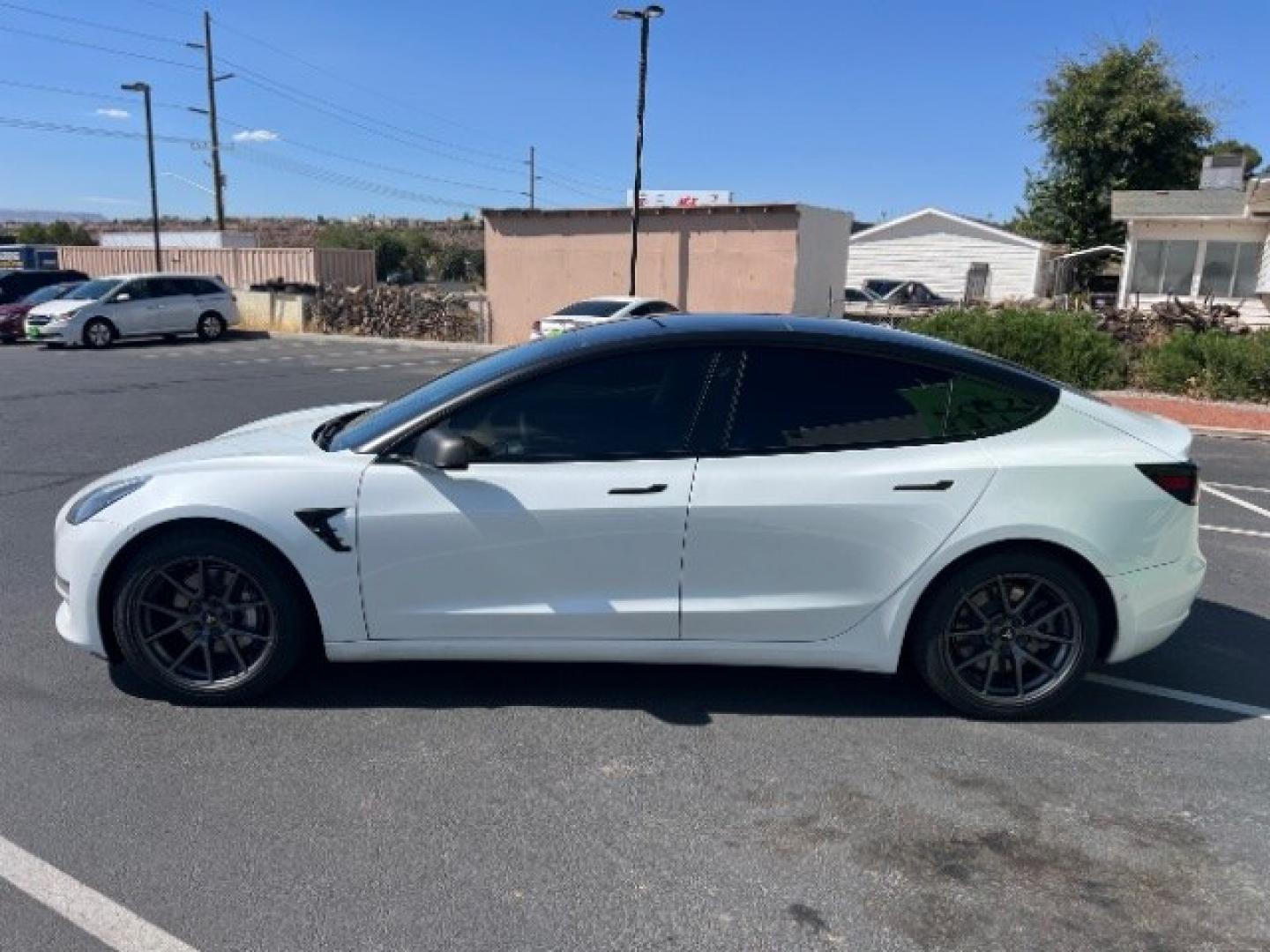 2021 Pearl White Multi-Coat /Black Tesla Model 3 Long Range Dual Motor All-Wheel Drive (5YJ3E1EB1MF) with an ELECTRIC engine, Electric transmission, located at 1865 East Red Hills Pkwy, St. George, 84770, (435) 628-0023, 37.120850, -113.543640 - Very affordable Tesla Model 3 All Wheel Drive, Acceleration boost paid for! HW3 and 5 Seats Interior and exterior in great condition. Ready to roll Every Tesla we sell has had cabin air filter replaced, radiator cleaned, fluids topped AND comes with a mobile charging kit! Battery is healthy and ge- Photo#5