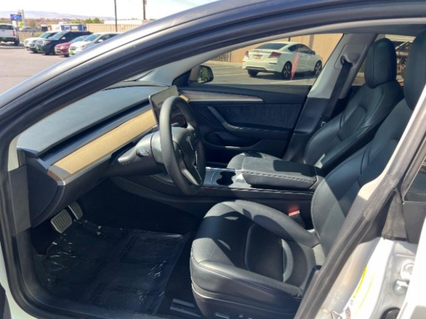 2021 Pearl White Multi-Coat /Black Tesla Model 3 Long Range Dual Motor All-Wheel Drive (5YJ3E1EB1MF) with an ELECTRIC engine, Electric transmission, located at 1865 East Red Hills Pkwy, St. George, 84770, (435) 628-0023, 37.120850, -113.543640 - Very affordable Tesla Model 3 All Wheel Drive, Acceleration boost paid for! HW3 and 5 Seats Interior and exterior in great condition. Ready to roll Every Tesla we sell has had cabin air filter replaced, radiator cleaned, fluids topped AND comes with a mobile charging kit! Battery is healthy and ge- Photo#16
