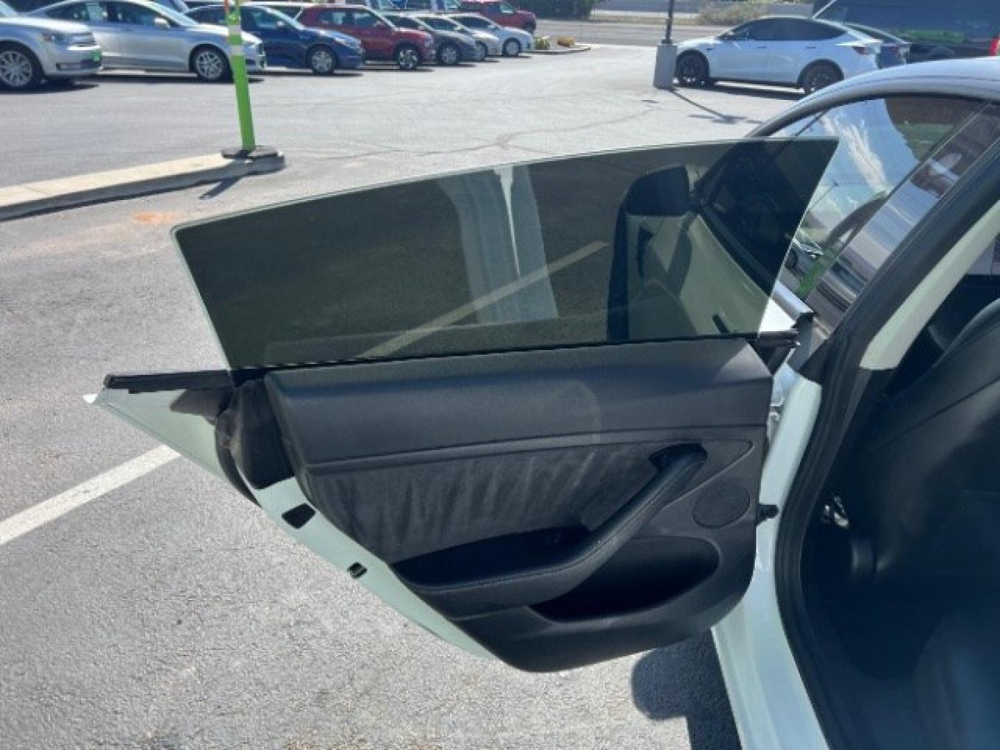 2021 Pearl White Multi-Coat /Black Tesla Model 3 Long Range Dual Motor All-Wheel Drive (5YJ3E1EB1MF) with an ELECTRIC engine, Electric transmission, located at 1865 East Red Hills Pkwy, St. George, 84770, (435) 628-0023, 37.120850, -113.543640 - Very affordable Tesla Model 3 All Wheel Drive, Acceleration boost paid for! HW3 and 5 Seats Interior and exterior in great condition. Ready to roll Every Tesla we sell has had cabin air filter replaced, radiator cleaned, fluids topped AND comes with a mobile charging kit! Battery is healthy and ge- Photo#20