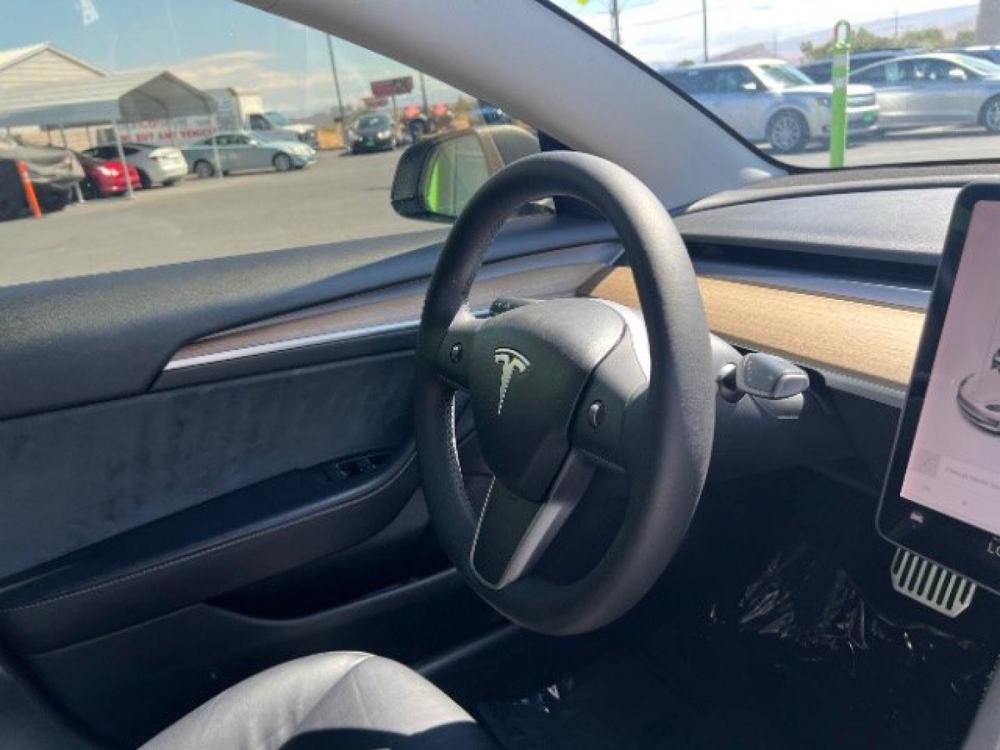 2021 Pearl White Multi-Coat /Black Tesla Model 3 Long Range Dual Motor All-Wheel Drive (5YJ3E1EB1MF) with an ELECTRIC engine, Electric transmission, located at 1865 East Red Hills Pkwy, St. George, 84770, (435) 628-0023, 37.120850, -113.543640 - Very affordable Tesla Model 3 All Wheel Drive, Acceleration boost paid for! HW3 and 5 Seats Interior and exterior in great condition. Ready to roll Every Tesla we sell has had cabin air filter replaced, radiator cleaned, fluids topped AND comes with a mobile charging kit! Battery is healthy and ge- Photo#28