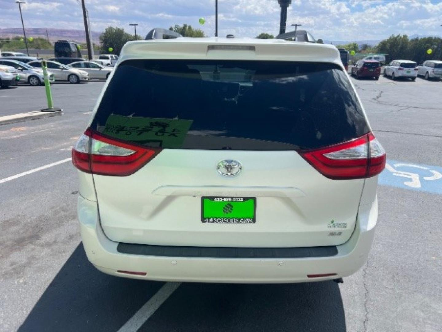 2016 White /Beige Leather Toyota Sienna XLE 8 Passenger | XLE 7 Passenger | Limited 7 Passenger | XLE Premium 8 Pas (5TDYK3DC9GS) with an 3.5L V-6 DOHC engine, Automatic transmission, located at 1865 East Red Hills Pkwy, St. George, 84770, (435) 628-0023, 37.120850, -113.543640 - Versatile Southern Utah travel starts with this 2016 Toyota Sienna XLE. Its 3.5L V6 engine, automatic transmission, and front-wheel drive make it a smart fit for family trips, school runs, and long highway travel. With 107858 miles, this Sienna is ready for its next adventure. The XLE adds beige le- Photo#5