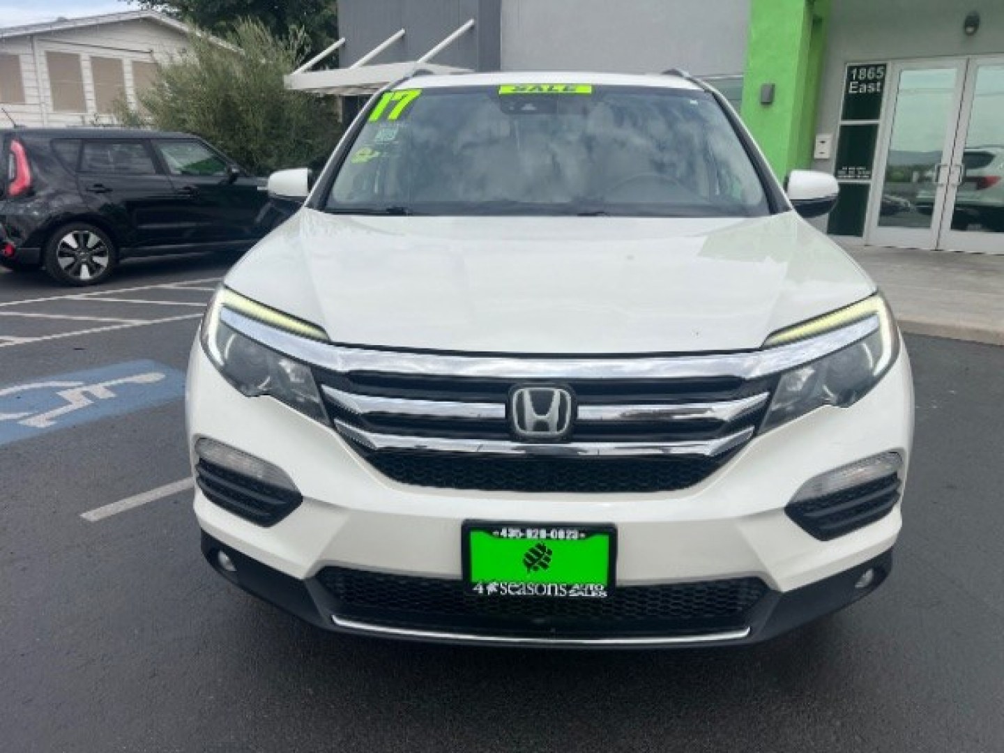 2017 White Diamond Pearl /Beige Honda Pilot Elite (5FNYF6H08HB) with an 3.5L V-6 gasoline direct injection engine, Automatic transmission, located at 1865 East Red Hills Pkwy, St. George, 84770, (435) 628-0023, 37.120850, -113.543640 - We specialize in helping ALL people get the best financing available. No matter your credit score, good, bad or none we can get you an amazing rate. Had a bankruptcy, divorce, or repossessions? We give you the green light to get your credit back on the road. Low down and affordable payments that fit- Photo#1