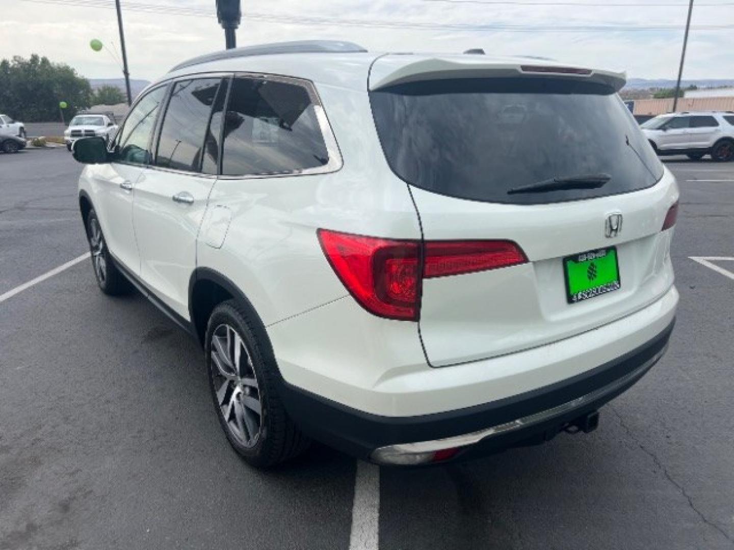 2017 White Diamond Pearl /Beige Honda Pilot Elite (5FNYF6H08HB) with an 3.5L V-6 gasoline direct injection engine, Automatic transmission, located at 1865 East Red Hills Pkwy, St. George, 84770, (435) 628-0023, 37.120850, -113.543640 - We specialize in helping ALL people get the best financing available. No matter your credit score, good, bad or none we can get you an amazing rate. Had a bankruptcy, divorce, or repossessions? We give you the green light to get your credit back on the road. Low down and affordable payments that fit- Photo#4