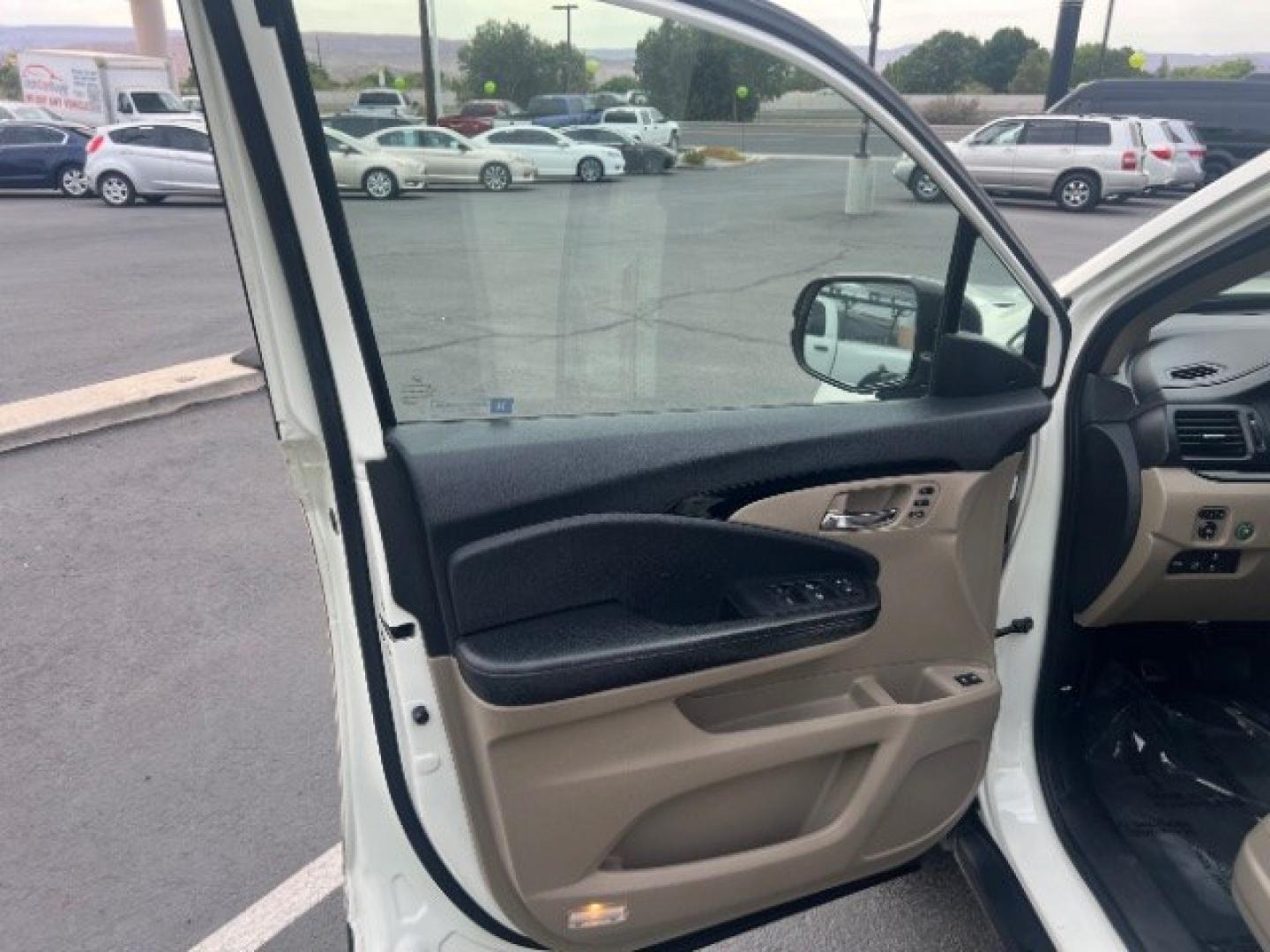 2017 White Diamond Pearl /Beige Honda Pilot Elite (5FNYF6H08HB) with an 3.5L V-6 gasoline direct injection engine, Automatic transmission, located at 1865 East Red Hills Pkwy, St. George, 84770, (435) 628-0023, 37.120850, -113.543640 - We specialize in helping ALL people get the best financing available. No matter your credit score, good, bad or none we can get you an amazing rate. Had a bankruptcy, divorce, or repossessions? We give you the green light to get your credit back on the road. Low down and affordable payments that fit- Photo#12