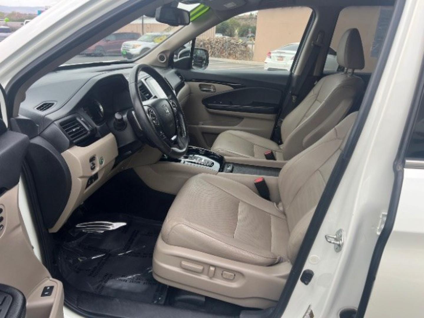 2017 White Diamond Pearl /Beige Honda Pilot Elite (5FNYF6H08HB) with an 3.5L V-6 gasoline direct injection engine, Automatic transmission, located at 1865 East Red Hills Pkwy, St. George, 84770, (435) 628-0023, 37.120850, -113.543640 - We specialize in helping ALL people get the best financing available. No matter your credit score, good, bad or none we can get you an amazing rate. Had a bankruptcy, divorce, or repossessions? We give you the green light to get your credit back on the road. Low down and affordable payments that fit- Photo#14