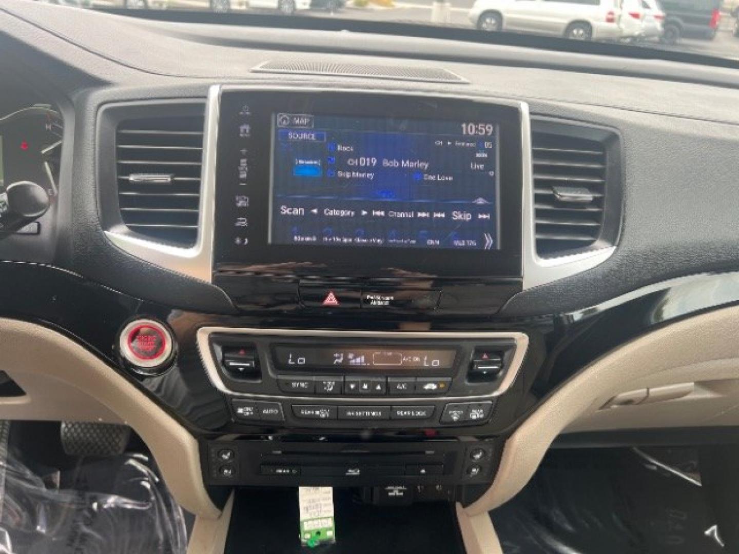 2017 White Diamond Pearl /Beige Honda Pilot Elite (5FNYF6H08HB) with an 3.5L V-6 gasoline direct injection engine, Automatic transmission, located at 1865 East Red Hills Pkwy, St. George, 84770, (435) 628-0023, 37.120850, -113.543640 - We specialize in helping ALL people get the best financing available. No matter your credit score, good, bad or none we can get you an amazing rate. Had a bankruptcy, divorce, or repossessions? We give you the green light to get your credit back on the road. Low down and affordable payments that fit- Photo#17