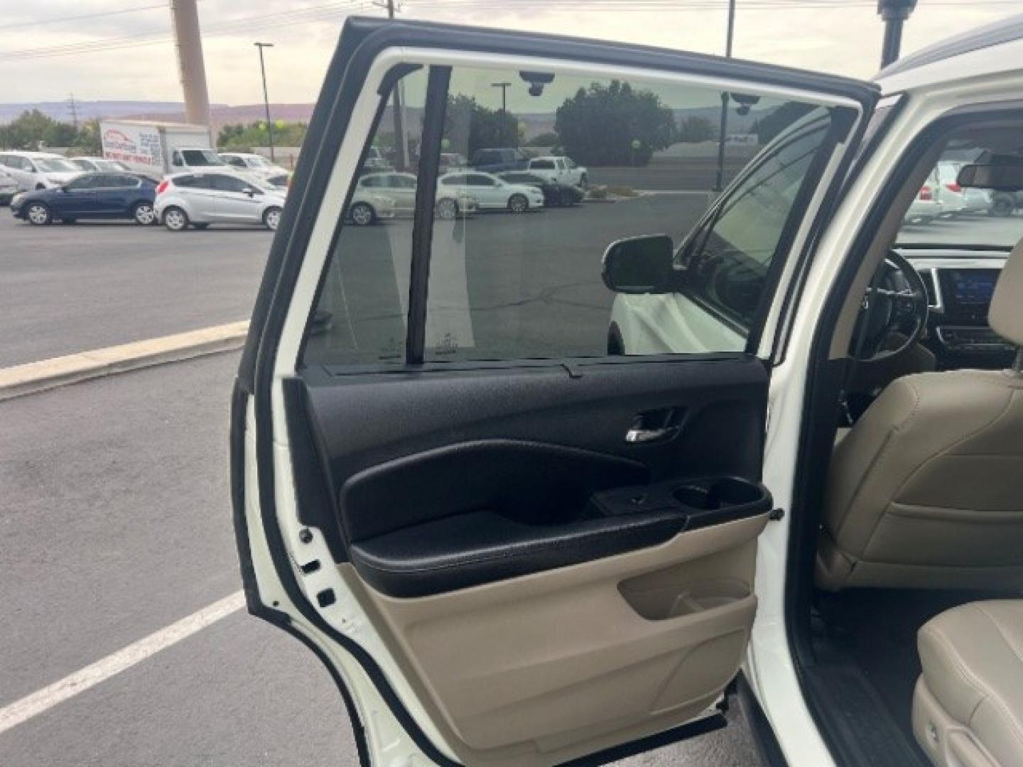 2017 White Diamond Pearl /Beige Honda Pilot Elite (5FNYF6H08HB) with an 3.5L V-6 gasoline direct injection engine, Automatic transmission, located at 1865 East Red Hills Pkwy, St. George, 84770, (435) 628-0023, 37.120850, -113.543640 - We specialize in helping ALL people get the best financing available. No matter your credit score, good, bad or none we can get you an amazing rate. Had a bankruptcy, divorce, or repossessions? We give you the green light to get your credit back on the road. Low down and affordable payments that fit- Photo#19