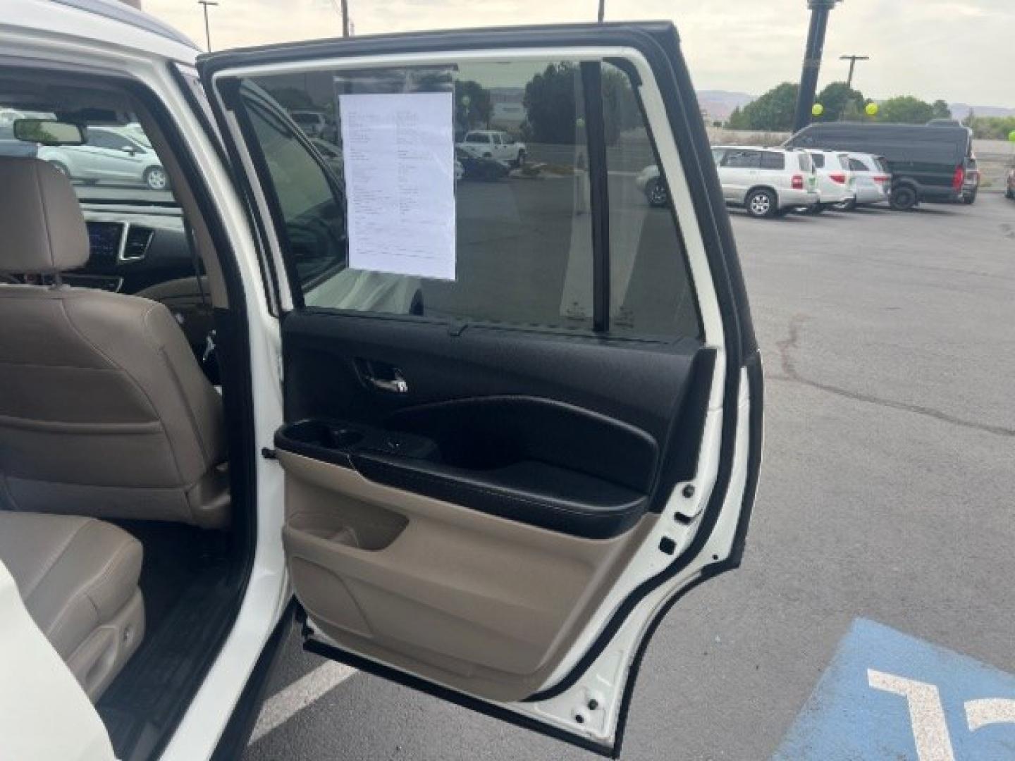 2017 White Diamond Pearl /Beige Honda Pilot Elite (5FNYF6H08HB) with an 3.5L V-6 gasoline direct injection engine, Automatic transmission, located at 1865 East Red Hills Pkwy, St. George, 84770, (435) 628-0023, 37.120850, -113.543640 - We specialize in helping ALL people get the best financing available. No matter your credit score, good, bad or none we can get you an amazing rate. Had a bankruptcy, divorce, or repossessions? We give you the green light to get your credit back on the road. Low down and affordable payments that fit- Photo#28