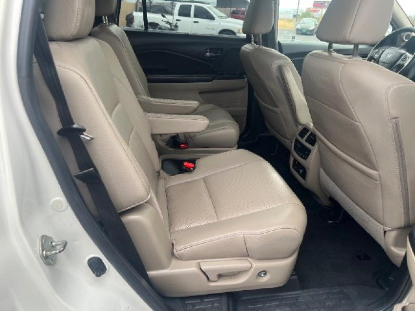 2017 White Diamond Pearl /Beige Honda Pilot Elite (5FNYF6H08HB) with an 3.5L V-6 gasoline direct injection engine, Automatic transmission, located at 1865 East Red Hills Pkwy, St. George, 84770, (435) 628-0023, 37.120850, -113.543640 - We specialize in helping ALL people get the best financing available. No matter your credit score, good, bad or none we can get you an amazing rate. Had a bankruptcy, divorce, or repossessions? We give you the green light to get your credit back on the road. Low down and affordable payments that fit- Photo#29