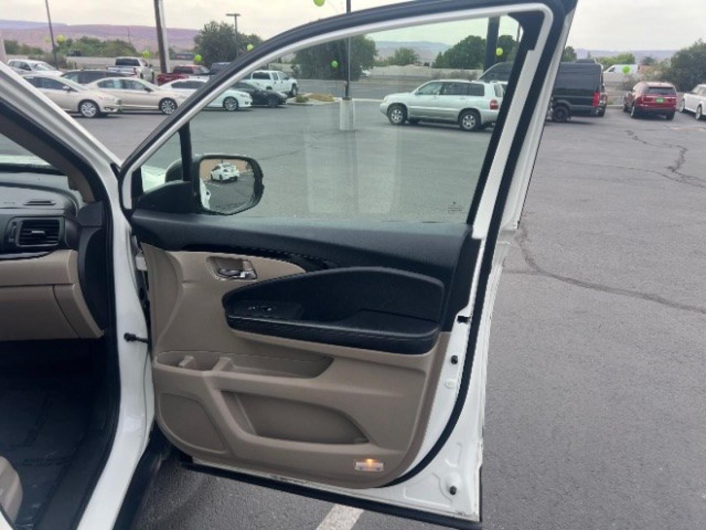 2017 White Diamond Pearl /Beige Honda Pilot Elite (5FNYF6H08HB) with an 3.5L V-6 gasoline direct injection engine, Automatic transmission, located at 1865 East Red Hills Pkwy, St. George, 84770, (435) 628-0023, 37.120850, -113.543640 - We specialize in helping ALL people get the best financing available. No matter your credit score, good, bad or none we can get you an amazing rate. Had a bankruptcy, divorce, or repossessions? We give you the green light to get your credit back on the road. Low down and affordable payments that fit- Photo#30