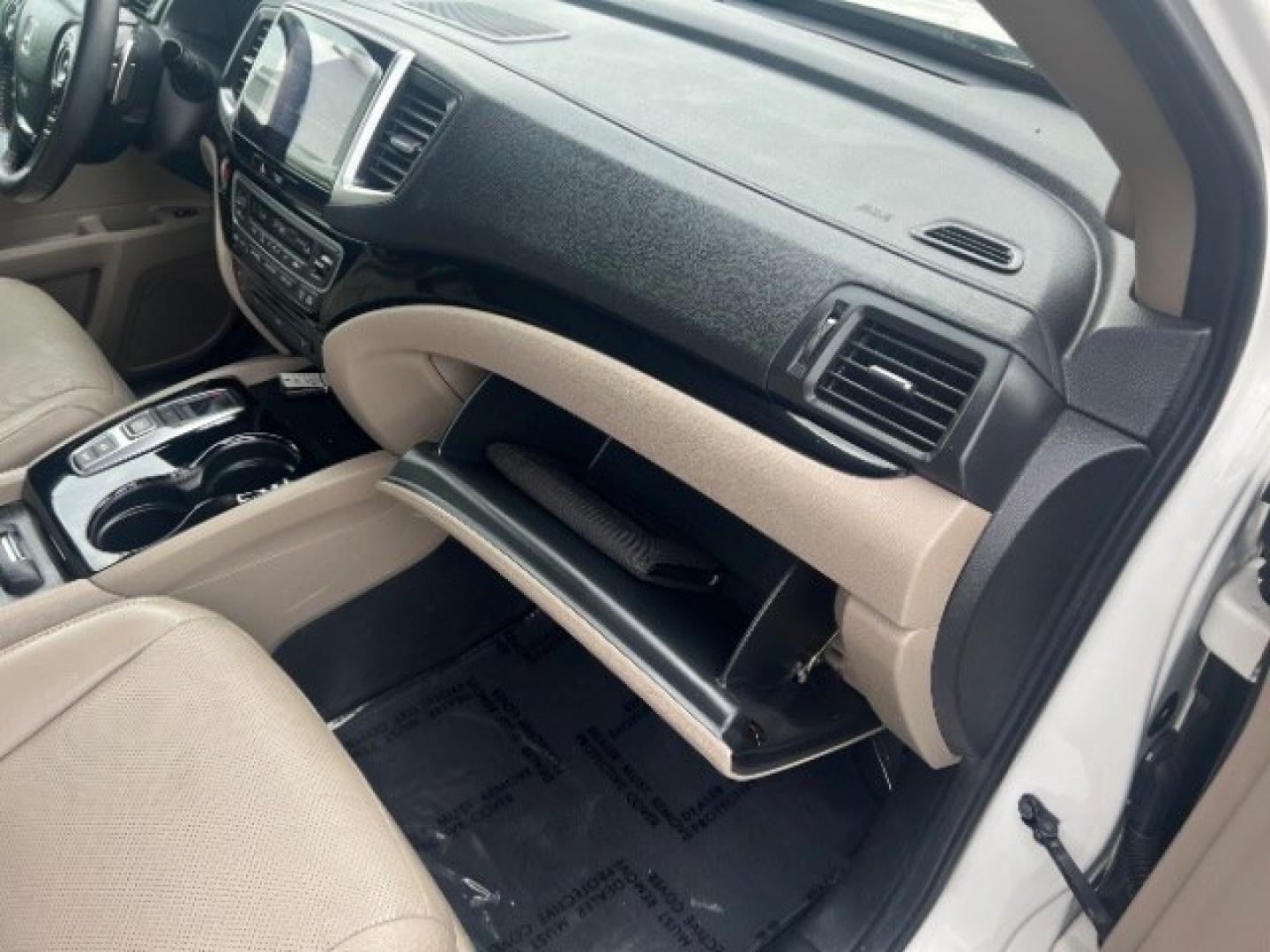 2017 White Diamond Pearl /Beige Honda Pilot Elite (5FNYF6H08HB) with an 3.5L V-6 gasoline direct injection engine, Automatic transmission, located at 1865 East Red Hills Pkwy, St. George, 84770, (435) 628-0023, 37.120850, -113.543640 - We specialize in helping ALL people get the best financing available. No matter your credit score, good, bad or none we can get you an amazing rate. Had a bankruptcy, divorce, or repossessions? We give you the green light to get your credit back on the road. Low down and affordable payments that fit- Photo#32