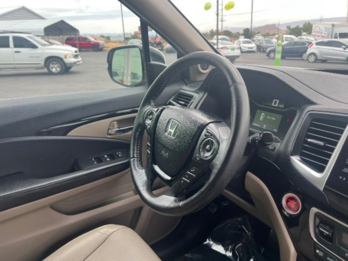 2017 White Diamond Pearl /Beige Honda Pilot Elite (5FNYF6H08HB) with an 3.5L V-6 gasoline direct injection engine, Automatic transmission, located at 1865 East Red Hills Pkwy, St. George, 84770, (435) 628-0023, 37.120850, -113.543640 - We specialize in helping ALL people get the best financing available. No matter your credit score, good, bad or none we can get you an amazing rate. Had a bankruptcy, divorce, or repossessions? We give you the green light to get your credit back on the road. Low down and affordable payments that fit- Photo#33