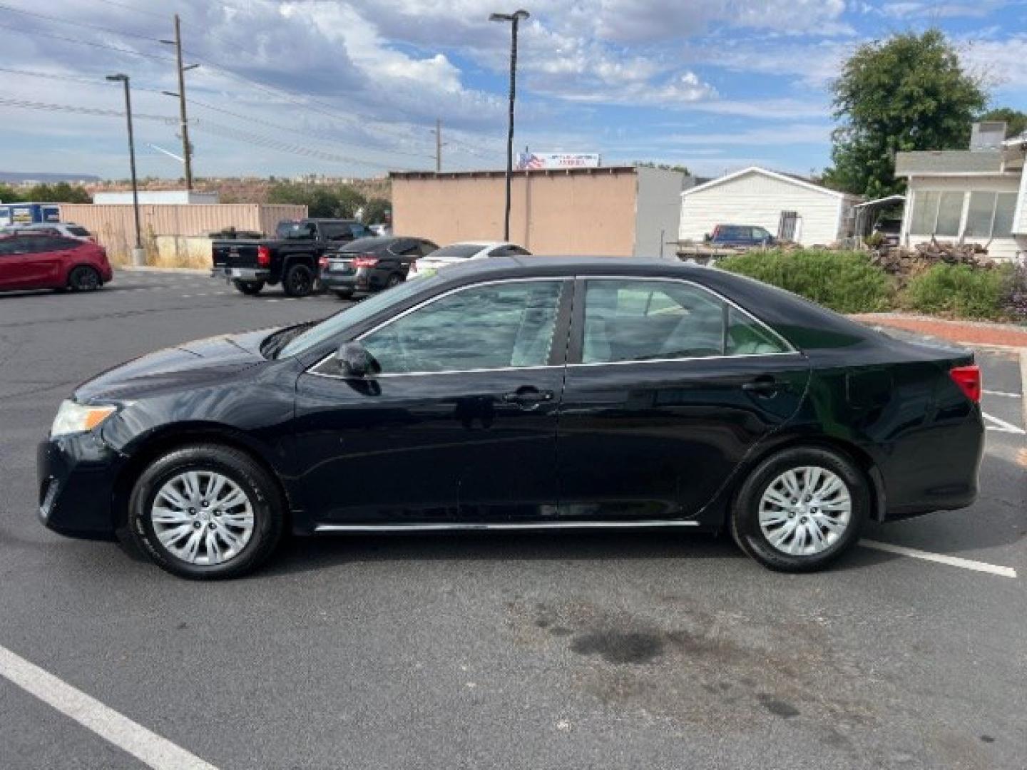 2012 Black /Gray Cloth Interior Toyota Camry Standard (4T1BF1FK0CU) with an 2.5L L4 DOHC 16V engine, 6-Speed Automatic transmission, located at 1865 East Red Hills Pkwy, St. George, 84770, (435) 628-0023, 37.120850, -113.543640 - We specialize in helping ALL people get the best financing available. No matter your credit score, good, bad or none we can get you an amazing rate. Had a bankruptcy, divorce, or repossessions? We give you the green light to get your credit back on the road. Low down and affordable payments that fit- Photo#3