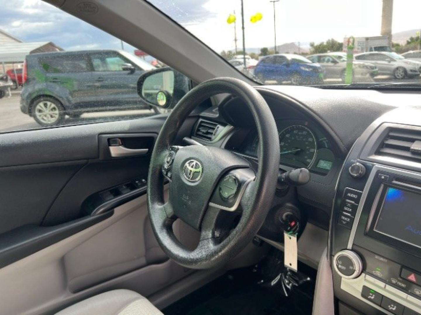 2012 Black /Gray Cloth Interior Toyota Camry Standard (4T1BF1FK0CU) with an 2.5L L4 DOHC 16V engine, 6-Speed Automatic transmission, located at 1865 East Red Hills Pkwy, St. George, 84770, (435) 628-0023, 37.120850, -113.543640 - We specialize in helping ALL people get the best financing available. No matter your credit score, good, bad or none we can get you an amazing rate. Had a bankruptcy, divorce, or repossessions? We give you the green light to get your credit back on the road. Low down and affordable payments that fit- Photo#30